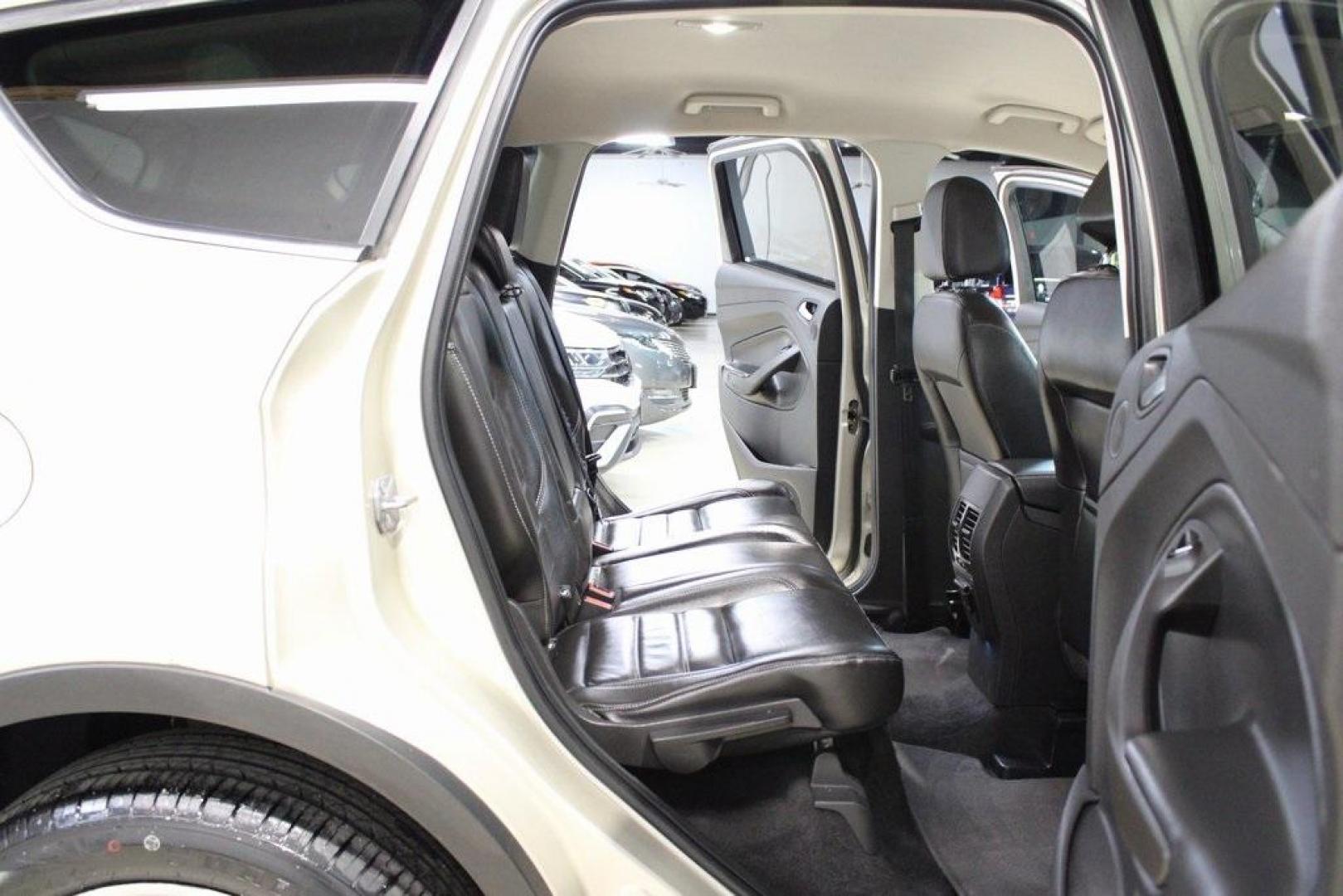 2017 White Gold /Charcoal Black Ford Escape Titanium (1FMCU0J91HU) with an EcoBoost 2.0L I4 GTDi DOHC Turbocharged VCT engine, Automatic transmission, located at 15300 Midway Rd., Addison, TX, 75001, (972) 702-0011, 32.958321, -96.838074 - Photo#15