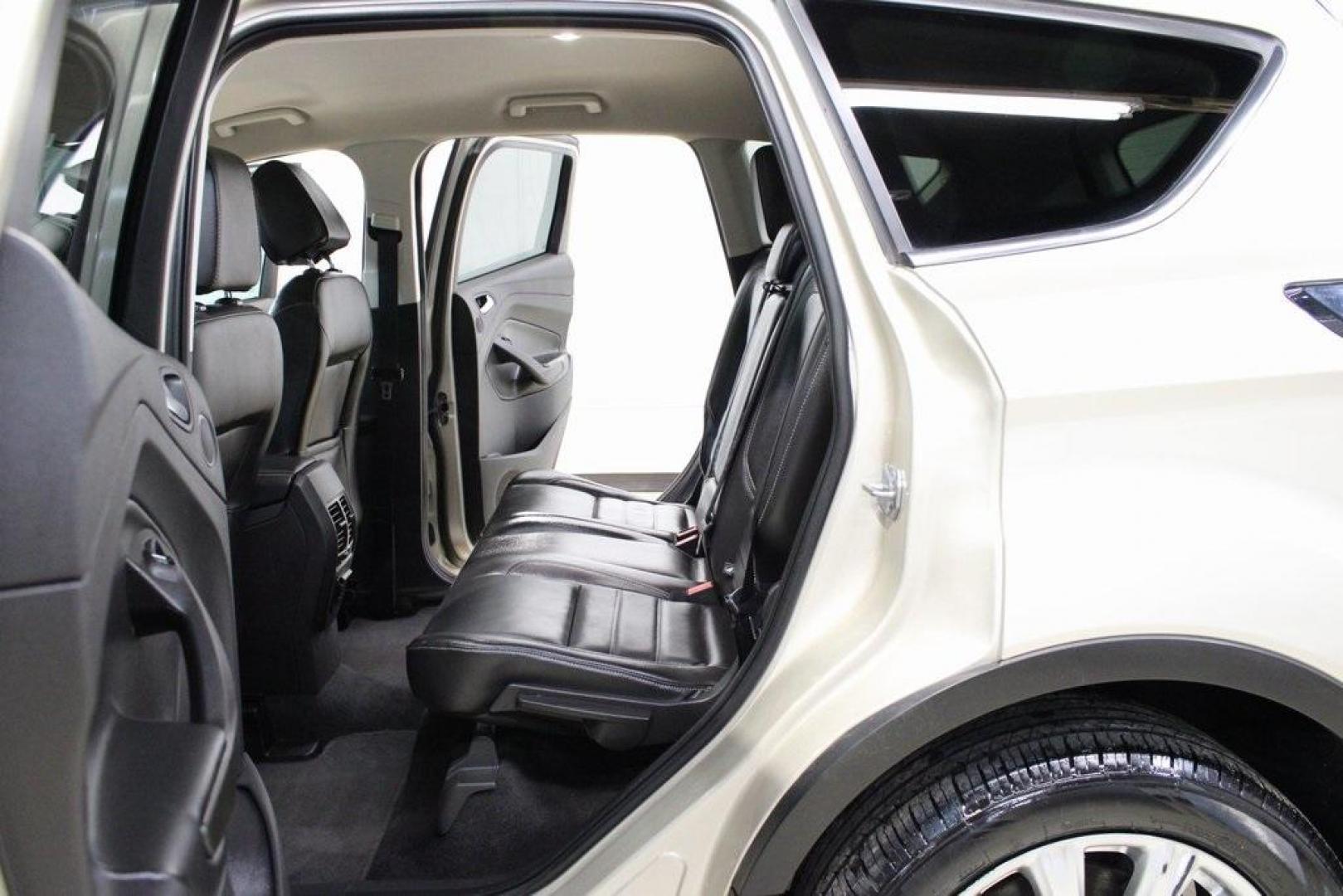 2017 White Gold /Charcoal Black Ford Escape Titanium (1FMCU0J91HU) with an EcoBoost 2.0L I4 GTDi DOHC Turbocharged VCT engine, Automatic transmission, located at 15300 Midway Rd., Addison, TX, 75001, (972) 702-0011, 32.958321, -96.838074 - Photo#16