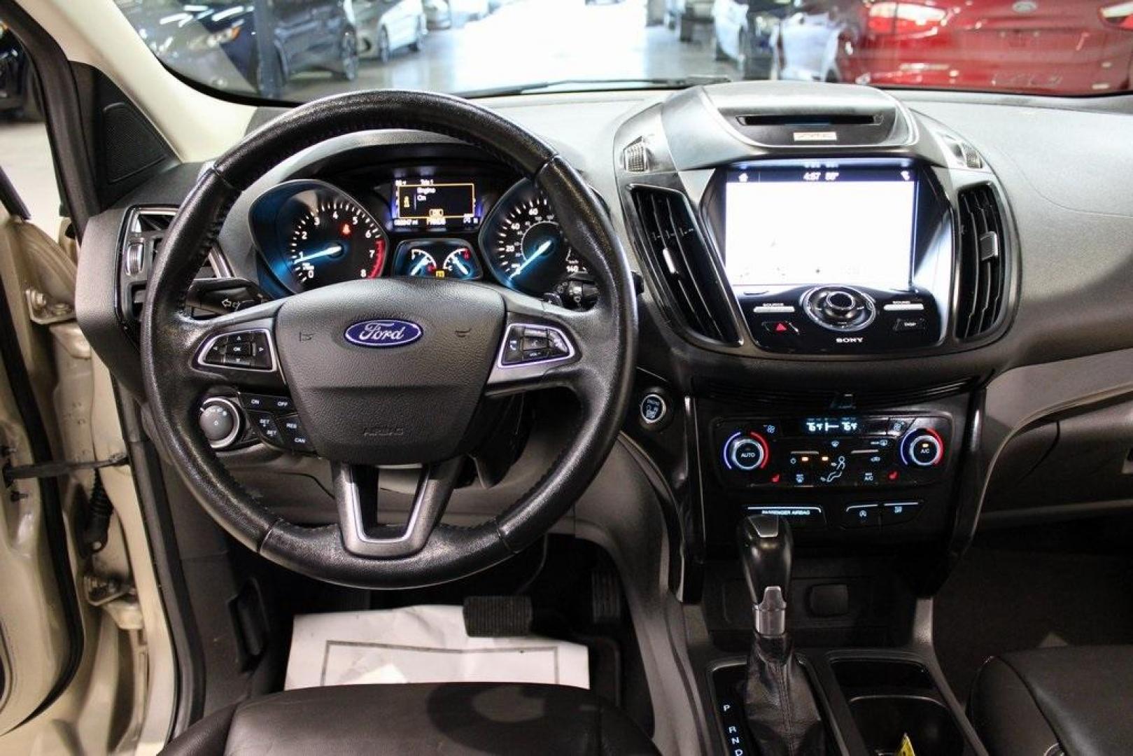 2017 White Gold /Charcoal Black Ford Escape Titanium (1FMCU0J91HU) with an EcoBoost 2.0L I4 GTDi DOHC Turbocharged VCT engine, Automatic transmission, located at 15300 Midway Rd., Addison, TX, 75001, (972) 702-0011, 32.958321, -96.838074 - Photo#17