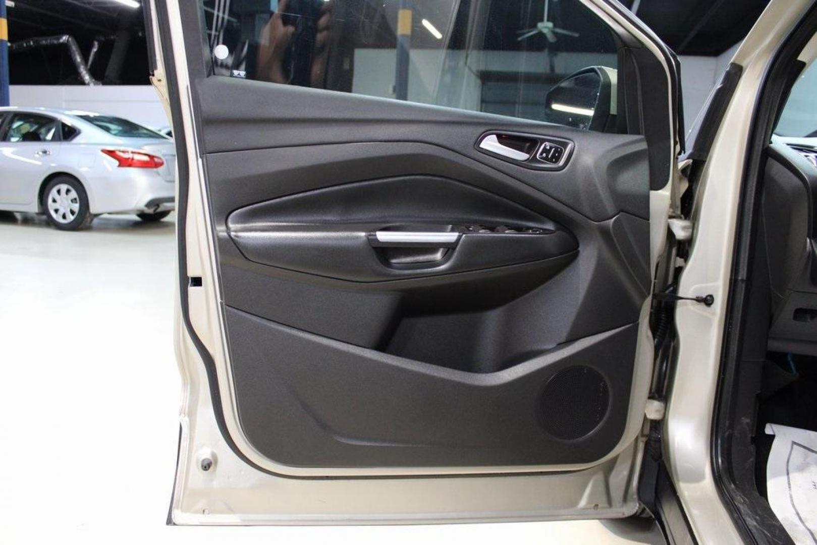 2017 White Gold /Charcoal Black Ford Escape Titanium (1FMCU0J91HU) with an EcoBoost 2.0L I4 GTDi DOHC Turbocharged VCT engine, Automatic transmission, located at 15300 Midway Rd., Addison, TX, 75001, (972) 702-0011, 32.958321, -96.838074 - Photo#27