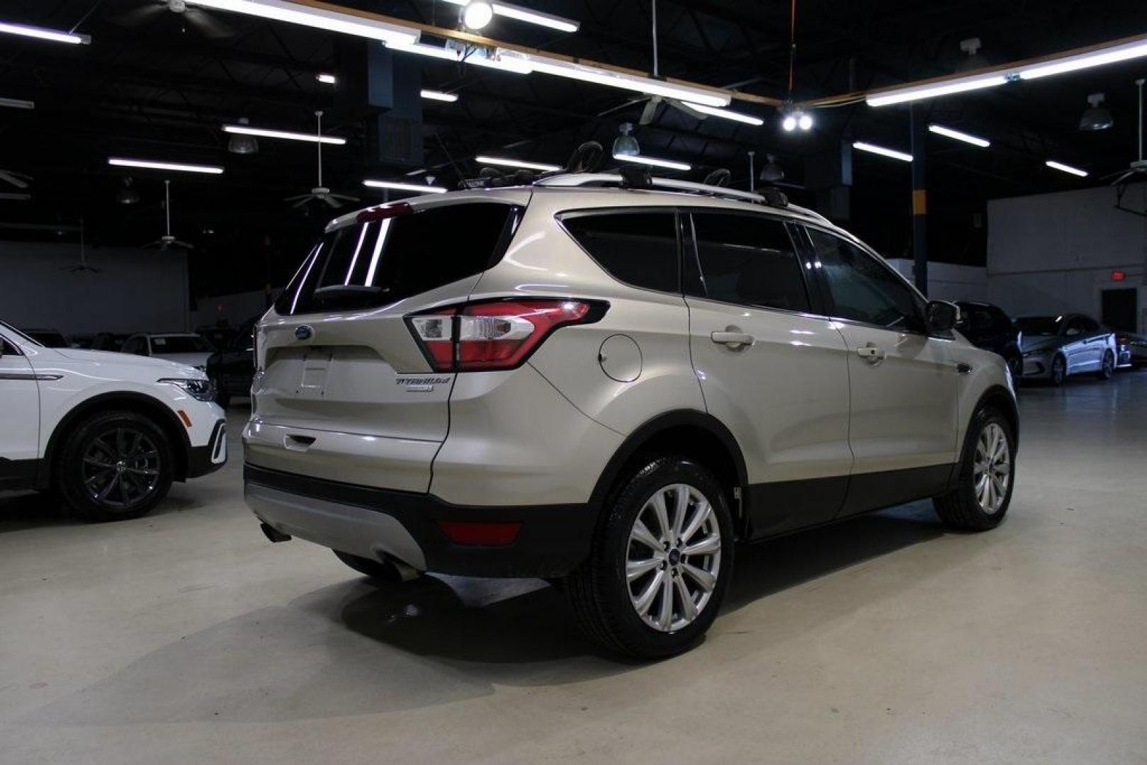 2017 White Gold /Charcoal Black Ford Escape Titanium (1FMCU0J91HU) with an EcoBoost 2.0L I4 GTDi DOHC Turbocharged VCT engine, Automatic transmission, located at 15300 Midway Rd., Addison, TX, 75001, (972) 702-0011, 32.958321, -96.838074 - Photo#2