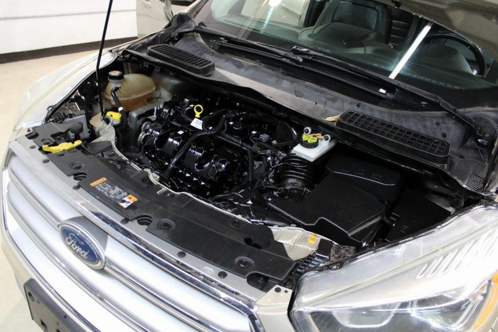 2017 White Gold /Charcoal Black Ford Escape Titanium (1FMCU0J91HU) with an EcoBoost 2.0L I4 GTDi DOHC Turbocharged VCT engine, Automatic transmission, located at 15300 Midway Rd., Addison, TX, 75001, (972) 702-0011, 32.958321, -96.838074 - Photo#31