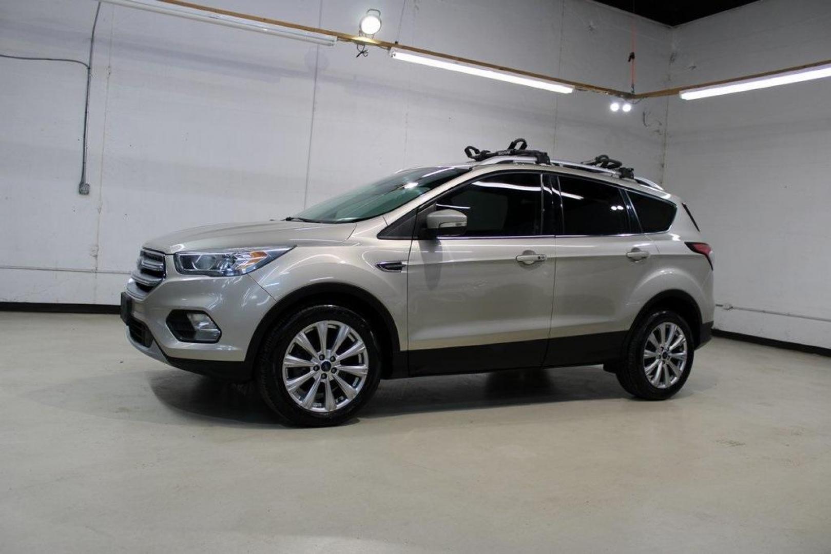 2017 White Gold /Charcoal Black Ford Escape Titanium (1FMCU0J91HU) with an EcoBoost 2.0L I4 GTDi DOHC Turbocharged VCT engine, Automatic transmission, located at 15300 Midway Rd., Addison, TX, 75001, (972) 702-0011, 32.958321, -96.838074 - Photo#4