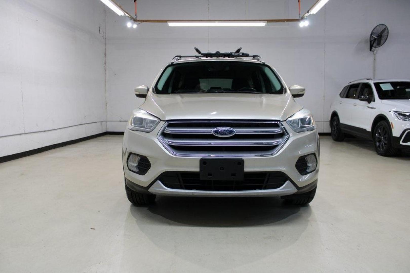 2017 White Gold /Charcoal Black Ford Escape Titanium (1FMCU0J91HU) with an EcoBoost 2.0L I4 GTDi DOHC Turbocharged VCT engine, Automatic transmission, located at 15300 Midway Rd., Addison, TX, 75001, (972) 702-0011, 32.958321, -96.838074 - Photo#5
