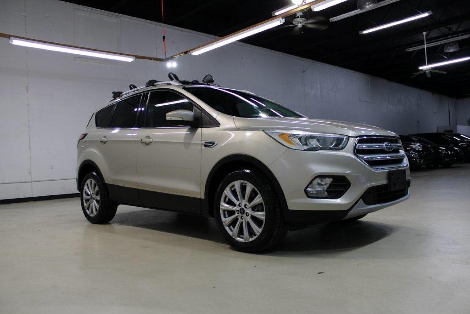 2017 White Gold /Charcoal Black Ford Escape Titanium (1FMCU0J91HU) with an EcoBoost 2.0L I4 GTDi DOHC Turbocharged VCT engine, Automatic transmission, located at 15300 Midway Rd., Addison, TX, 75001, (972) 702-0011, 32.958321, -96.838074 - Photo#6