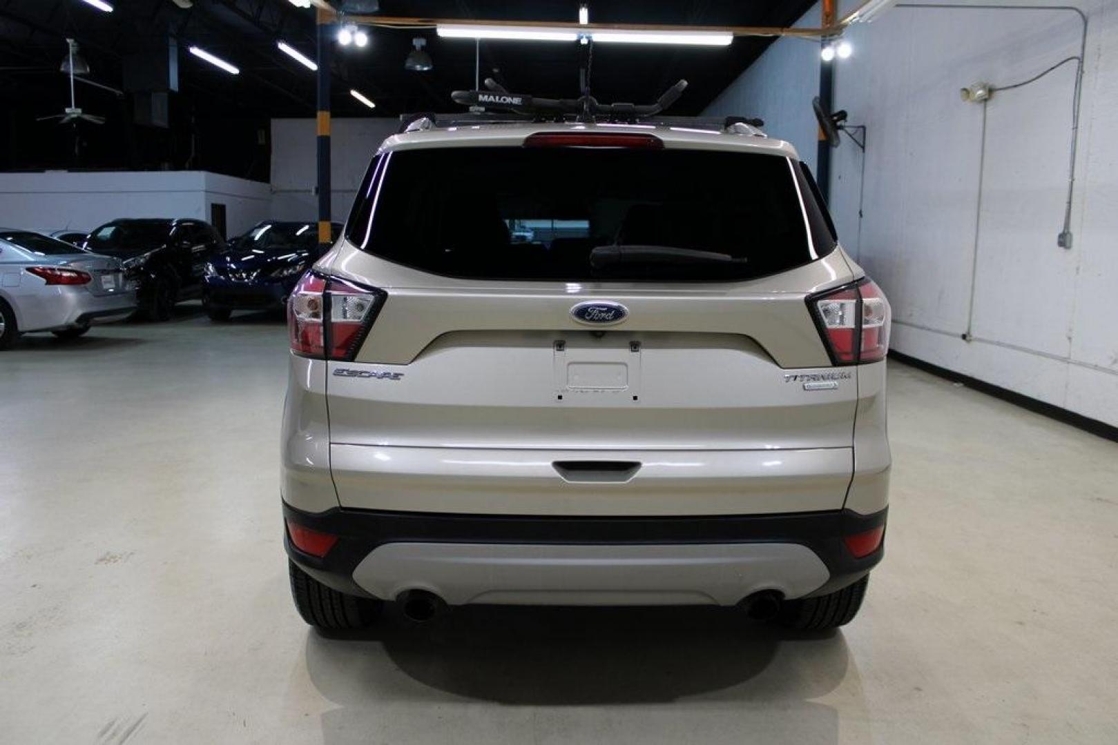 2017 White Gold /Charcoal Black Ford Escape Titanium (1FMCU0J91HU) with an EcoBoost 2.0L I4 GTDi DOHC Turbocharged VCT engine, Automatic transmission, located at 15300 Midway Rd., Addison, TX, 75001, (972) 702-0011, 32.958321, -96.838074 - Photo#7