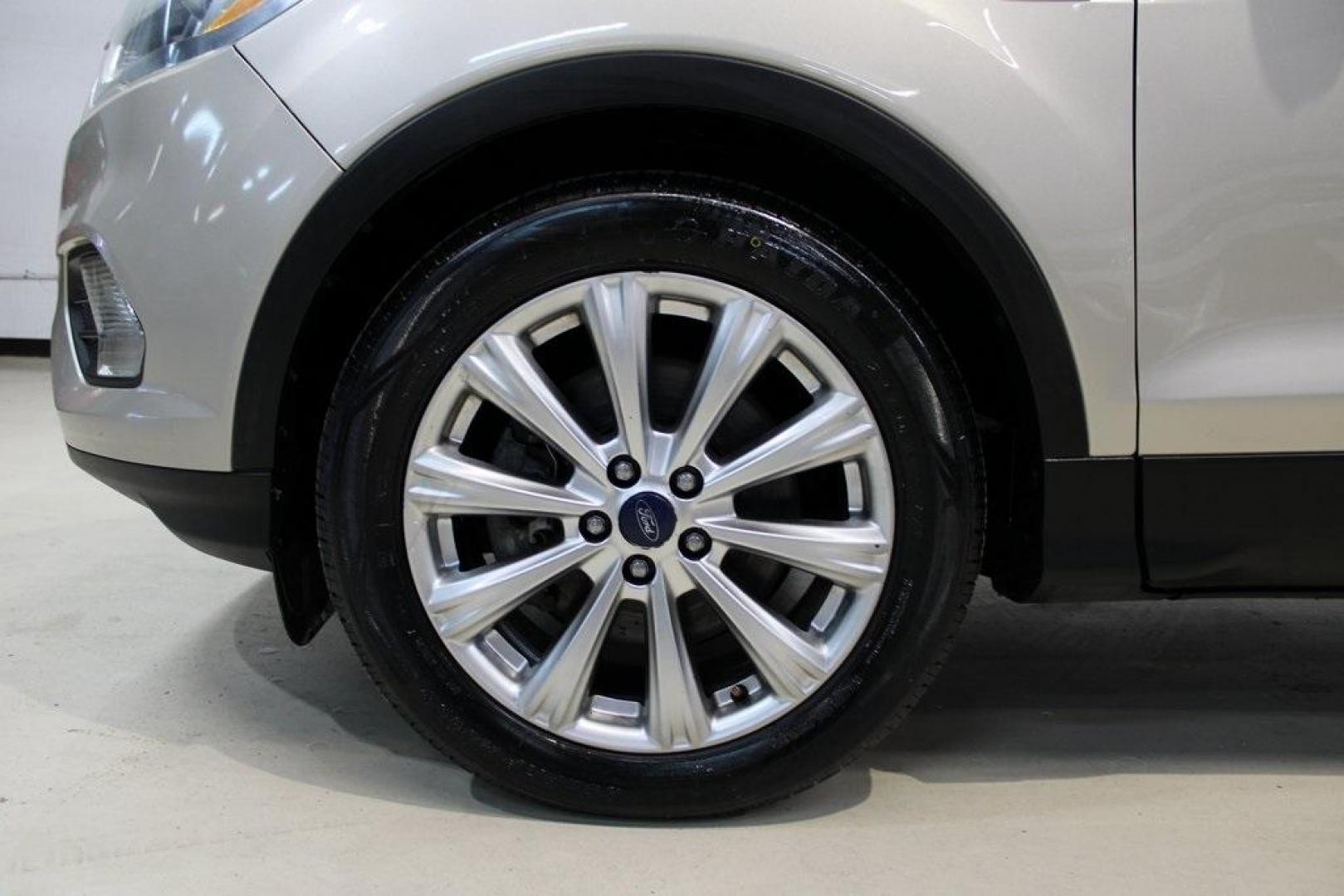 2017 White Gold /Charcoal Black Ford Escape Titanium (1FMCU0J91HU) with an EcoBoost 2.0L I4 GTDi DOHC Turbocharged VCT engine, Automatic transmission, located at 15300 Midway Rd., Addison, TX, 75001, (972) 702-0011, 32.958321, -96.838074 - Photo#8