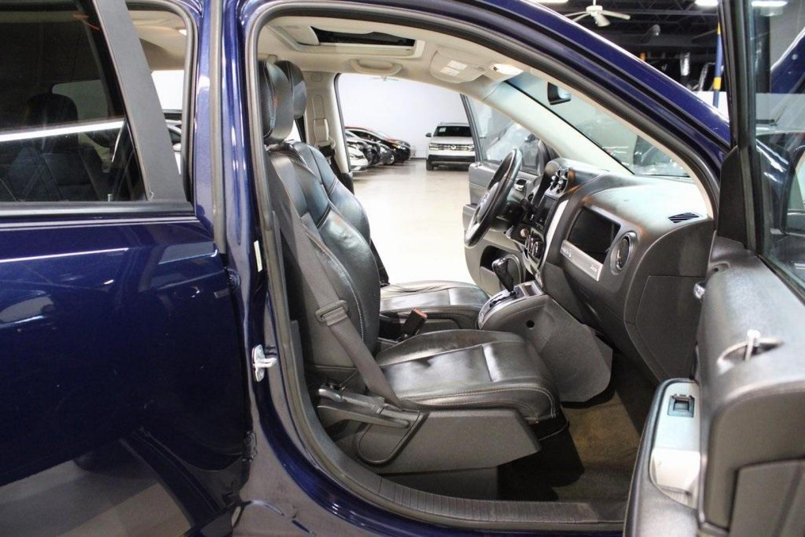2016 True Blue Pearlcoat /Gray Jeep Compass High Altitude (1C4NJDEB3GD) with an 2.4L I4 DOHC 16V Dual VVT engine, Automatic transmission, located at 15300 Midway Rd., Addison, TX, 75001, (972) 702-0011, 32.958321, -96.838074 - Introducing the 2016 Jeep Compass High Altitude, now available at Midway Auto Group in Addison, Texas. This versatile SUV combines rugged capability with refined comfort, making it an excellent choice for both urban commutes and weekend adventures.<br><br>Key Features:<br><br>Engine: 2.4L I4 DOHC 16 - Photo#18