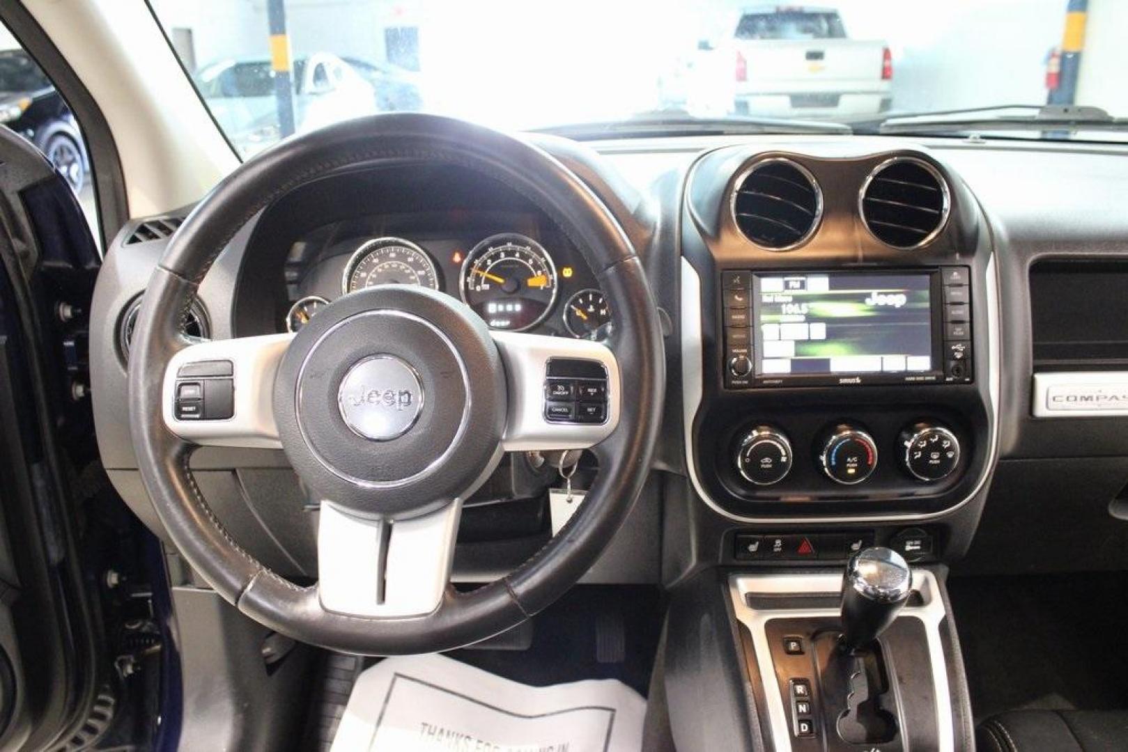 2016 True Blue Pearlcoat /Gray Jeep Compass High Altitude (1C4NJDEB3GD) with an 2.4L I4 DOHC 16V Dual VVT engine, Automatic transmission, located at 15300 Midway Rd., Addison, TX, 75001, (972) 702-0011, 32.958321, -96.838074 - Introducing the 2016 Jeep Compass High Altitude, now available at Midway Auto Group in Addison, Texas. This versatile SUV combines rugged capability with refined comfort, making it an excellent choice for both urban commutes and weekend adventures.<br><br>Key Features:<br><br>Engine: 2.4L I4 DOHC 16 - Photo#21