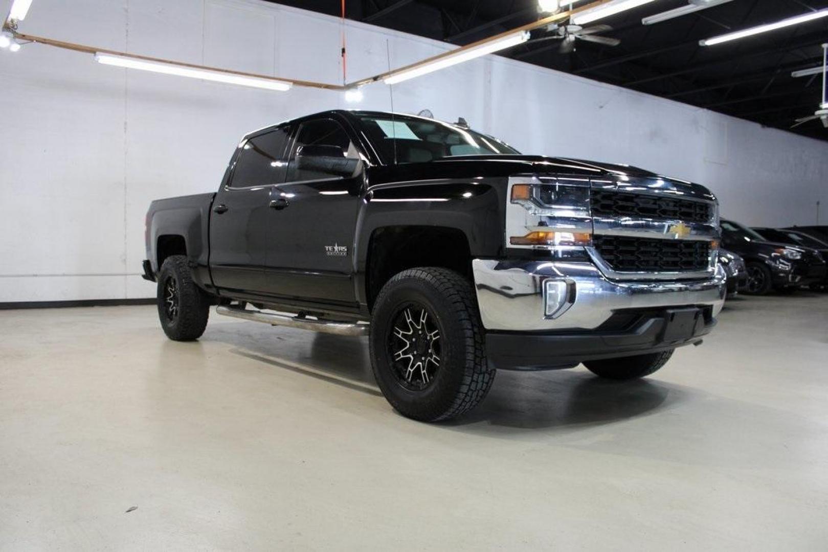 2017 Black /Cocoa/Dune Chevrolet Silverado 1500 LT (3GCPCREC5HG) with an EcoTec3 5.3L V8 engine, Automatic transmission, located at 15300 Midway Rd., Addison, TX, 75001, (972) 702-0011, 32.958321, -96.838074 - HOME OF THE NO HAGGLE PRICE - WHOLESALE PRICES TO THE PUBLIC!! Silverado 1500 LT LT1, 4D Crew Cab, EcoTec3 5.3L V8, 6-Speed Automatic Electronic with Overdrive, RWD, Black, Cocoa/Dune Cloth. Odometer is 1392 miles below market average!<br><br>Black 2017 Chevrolet Silverado 1500 LT<br><br><br>Awards: - Photo#1