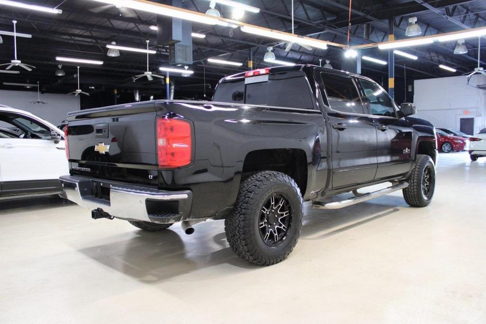 2017 Black /Cocoa/Dune Chevrolet Silverado 1500 LT (3GCPCREC5HG) with an EcoTec3 5.3L V8 engine, Automatic transmission, located at 15300 Midway Rd., Addison, TX, 75001, (972) 702-0011, 32.958321, -96.838074 - HOME OF THE NO HAGGLE PRICE - WHOLESALE PRICES TO THE PUBLIC!! Silverado 1500 LT LT1, 4D Crew Cab, EcoTec3 5.3L V8, 6-Speed Automatic Electronic with Overdrive, RWD, Black, Cocoa/Dune Cloth. Odometer is 1392 miles below market average!<br><br>Black 2017 Chevrolet Silverado 1500 LT<br><br><br>Awards: - Photo#2