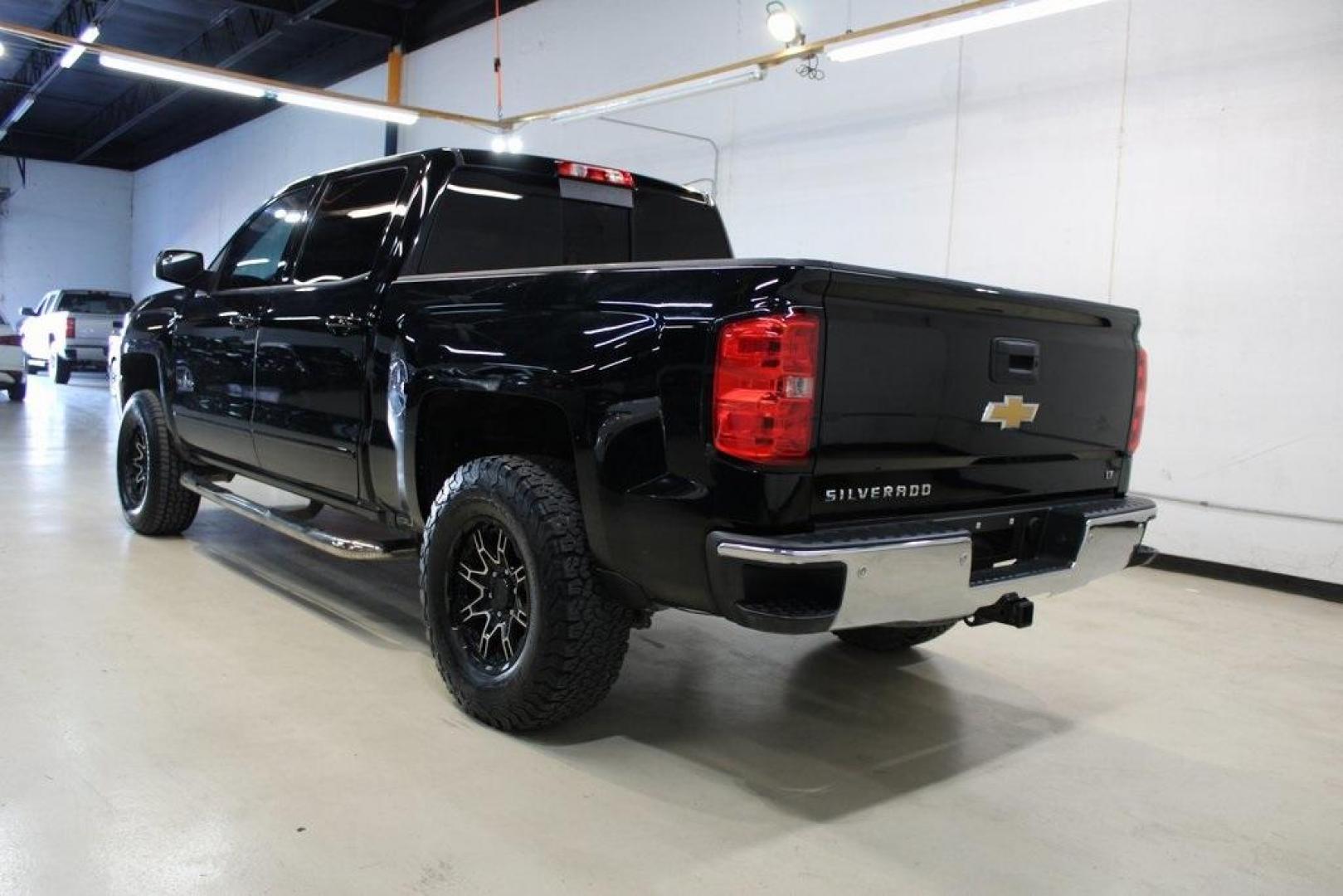 2017 Black /Cocoa/Dune Chevrolet Silverado 1500 LT (3GCPCREC5HG) with an EcoTec3 5.3L V8 engine, Automatic transmission, located at 15300 Midway Rd., Addison, TX, 75001, (972) 702-0011, 32.958321, -96.838074 - HOME OF THE NO HAGGLE PRICE - WHOLESALE PRICES TO THE PUBLIC!! Silverado 1500 LT LT1, 4D Crew Cab, EcoTec3 5.3L V8, 6-Speed Automatic Electronic with Overdrive, RWD, Black, Cocoa/Dune Cloth. Odometer is 1392 miles below market average!<br><br>Black 2017 Chevrolet Silverado 1500 LT<br><br><br>Awards: - Photo#3