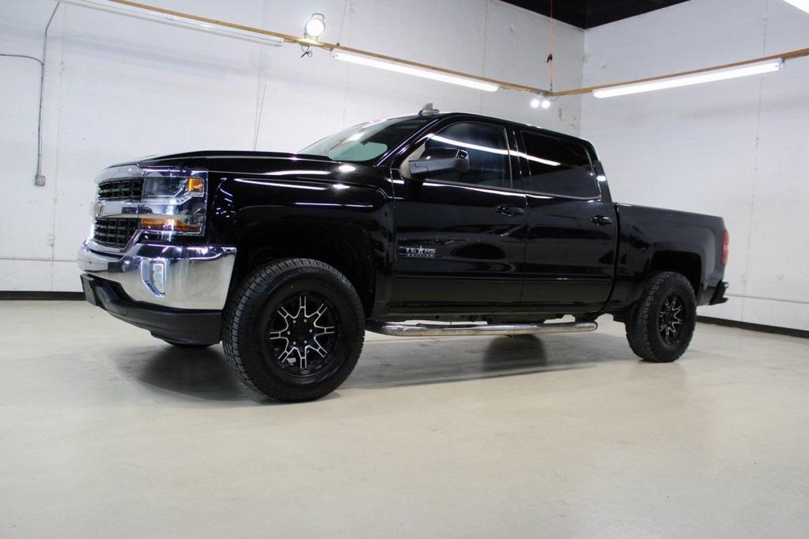 2017 Black /Cocoa/Dune Chevrolet Silverado 1500 LT (3GCPCREC5HG) with an EcoTec3 5.3L V8 engine, Automatic transmission, located at 15300 Midway Rd., Addison, TX, 75001, (972) 702-0011, 32.958321, -96.838074 - HOME OF THE NO HAGGLE PRICE - WHOLESALE PRICES TO THE PUBLIC!! Silverado 1500 LT LT1, 4D Crew Cab, EcoTec3 5.3L V8, 6-Speed Automatic Electronic with Overdrive, RWD, Black, Cocoa/Dune Cloth. Odometer is 1392 miles below market average!<br><br>Black 2017 Chevrolet Silverado 1500 LT<br><br><br>Awards: - Photo#4