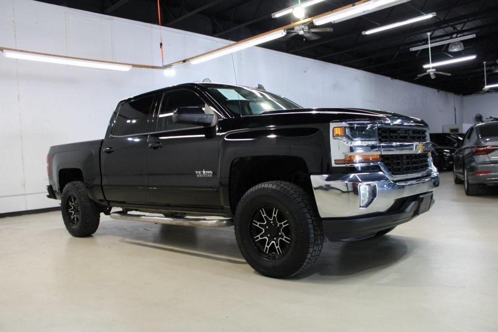 2017 Black /Cocoa/Dune Chevrolet Silverado 1500 LT (3GCPCREC5HG) with an EcoTec3 5.3L V8 engine, Automatic transmission, located at 15300 Midway Rd., Addison, TX, 75001, (972) 702-0011, 32.958321, -96.838074 - HOME OF THE NO HAGGLE PRICE - WHOLESALE PRICES TO THE PUBLIC!! Silverado 1500 LT LT1, 4D Crew Cab, EcoTec3 5.3L V8, 6-Speed Automatic Electronic with Overdrive, RWD, Black, Cocoa/Dune Cloth. Odometer is 1392 miles below market average!<br><br>Black 2017 Chevrolet Silverado 1500 LT<br><br><br>Awards: - Photo#6