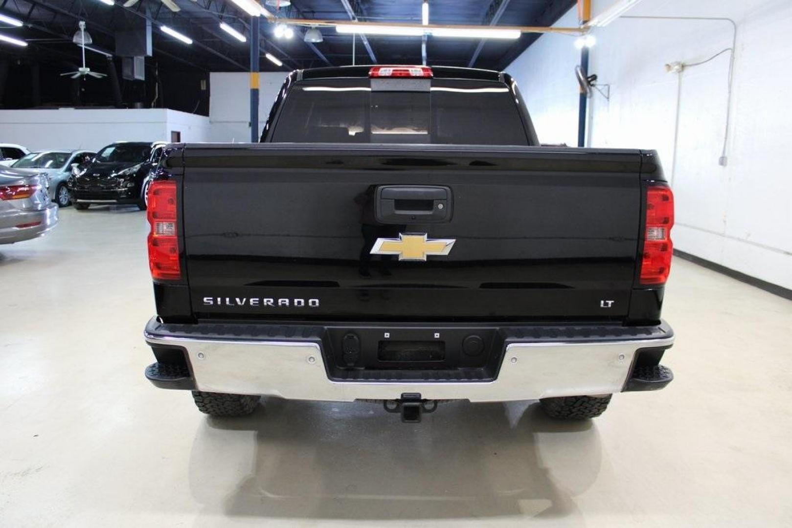 2017 Black /Cocoa/Dune Chevrolet Silverado 1500 LT (3GCPCREC5HG) with an EcoTec3 5.3L V8 engine, Automatic transmission, located at 15300 Midway Rd., Addison, TX, 75001, (972) 702-0011, 32.958321, -96.838074 - HOME OF THE NO HAGGLE PRICE - WHOLESALE PRICES TO THE PUBLIC!! Silverado 1500 LT LT1, 4D Crew Cab, EcoTec3 5.3L V8, 6-Speed Automatic Electronic with Overdrive, RWD, Black, Cocoa/Dune Cloth. Odometer is 1392 miles below market average!<br><br>Black 2017 Chevrolet Silverado 1500 LT<br><br><br>Awards: - Photo#7