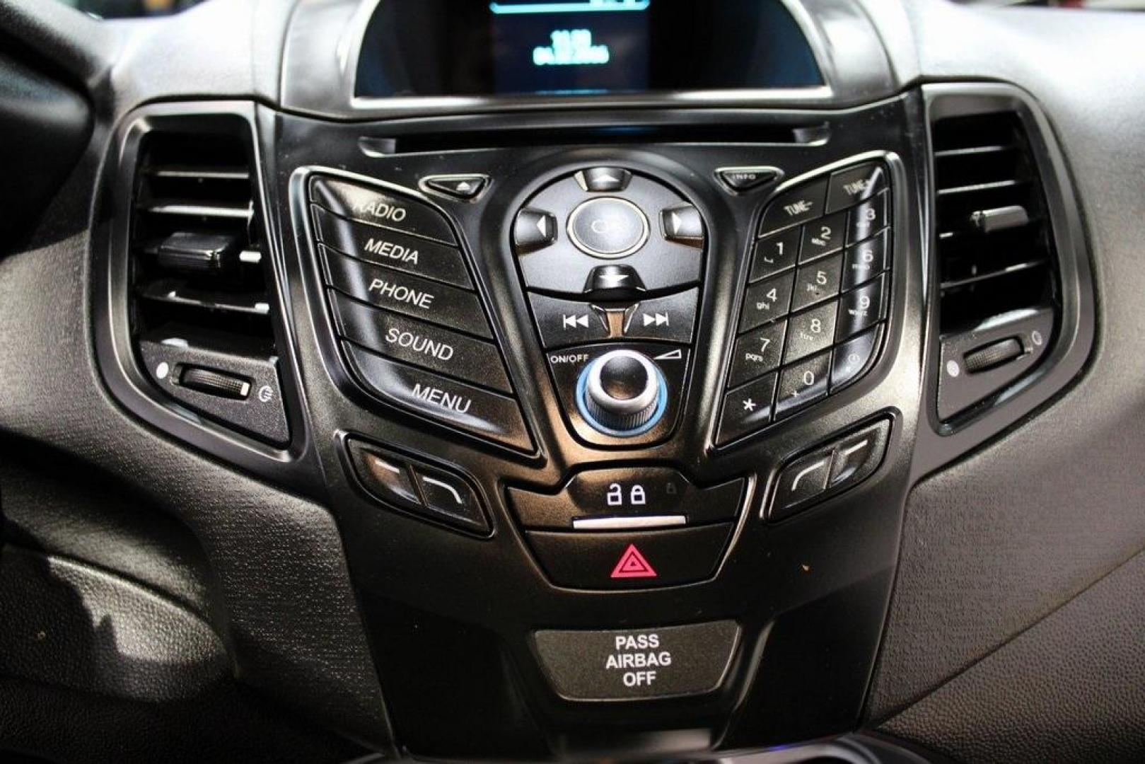 2016 Ingot Silver /Black Ford Fiesta SE (3FADP4EJ0GM) with an 1.6L I4 Ti-VCT engine, Automatic transmission, located at 15300 Midway Rd., Addison, TX, 75001, (972) 702-0011, 32.958321, -96.838074 - Introducing the 2016 Ford Fiesta SE, now available at Midway Auto Group in Addison, Texas. This compact sedan offers a perfect blend of efficiency, modern features, and spirited performance, making it an excellent choice for both city commutes and weekend adventures.<br><br>Key Features:<br><br>Engi - Photo#19