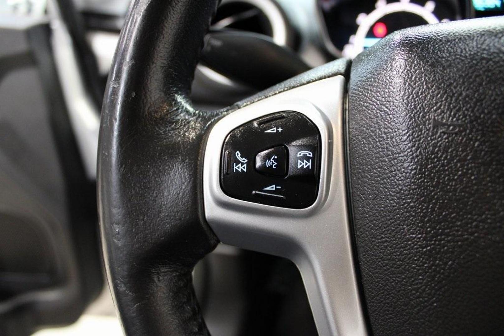 2016 Ingot Silver /Black Ford Fiesta SE (3FADP4EJ0GM) with an 1.6L I4 Ti-VCT engine, Automatic transmission, located at 15300 Midway Rd., Addison, TX, 75001, (972) 702-0011, 32.958321, -96.838074 - Introducing the 2016 Ford Fiesta SE, now available at Midway Auto Group in Addison, Texas. This compact sedan offers a perfect blend of efficiency, modern features, and spirited performance, making it an excellent choice for both city commutes and weekend adventures.<br><br>Key Features:<br><br>Engi - Photo#24