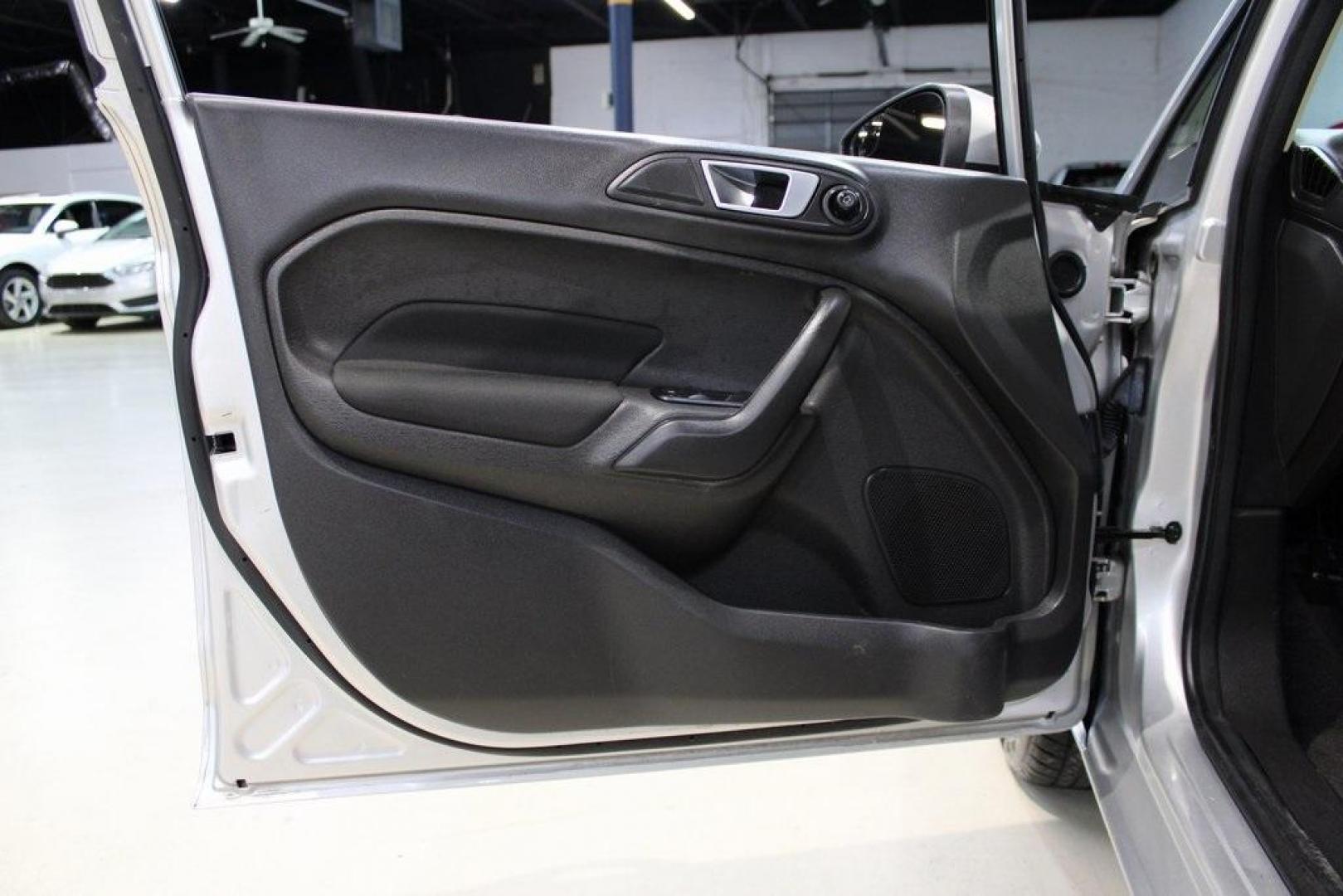 2016 Ingot Silver /Black Ford Fiesta SE (3FADP4EJ0GM) with an 1.6L I4 Ti-VCT engine, Automatic transmission, located at 15300 Midway Rd., Addison, TX, 75001, (972) 702-0011, 32.958321, -96.838074 - Introducing the 2016 Ford Fiesta SE, now available at Midway Auto Group in Addison, Texas. This compact sedan offers a perfect blend of efficiency, modern features, and spirited performance, making it an excellent choice for both city commutes and weekend adventures.<br><br>Key Features:<br><br>Engi - Photo#25