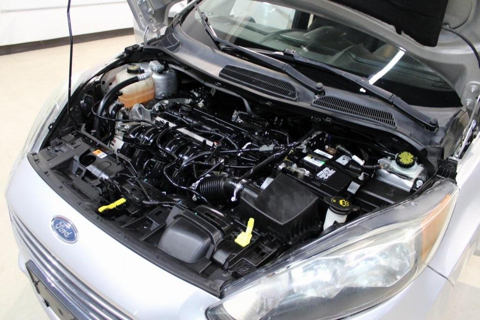 2016 Ingot Silver /Black Ford Fiesta SE (3FADP4EJ0GM) with an 1.6L I4 Ti-VCT engine, Automatic transmission, located at 15300 Midway Rd., Addison, TX, 75001, (972) 702-0011, 32.958321, -96.838074 - Introducing the 2016 Ford Fiesta SE, now available at Midway Auto Group in Addison, Texas. This compact sedan offers a perfect blend of efficiency, modern features, and spirited performance, making it an excellent choice for both city commutes and weekend adventures.<br><br>Key Features:<br><br>Engi - Photo#28