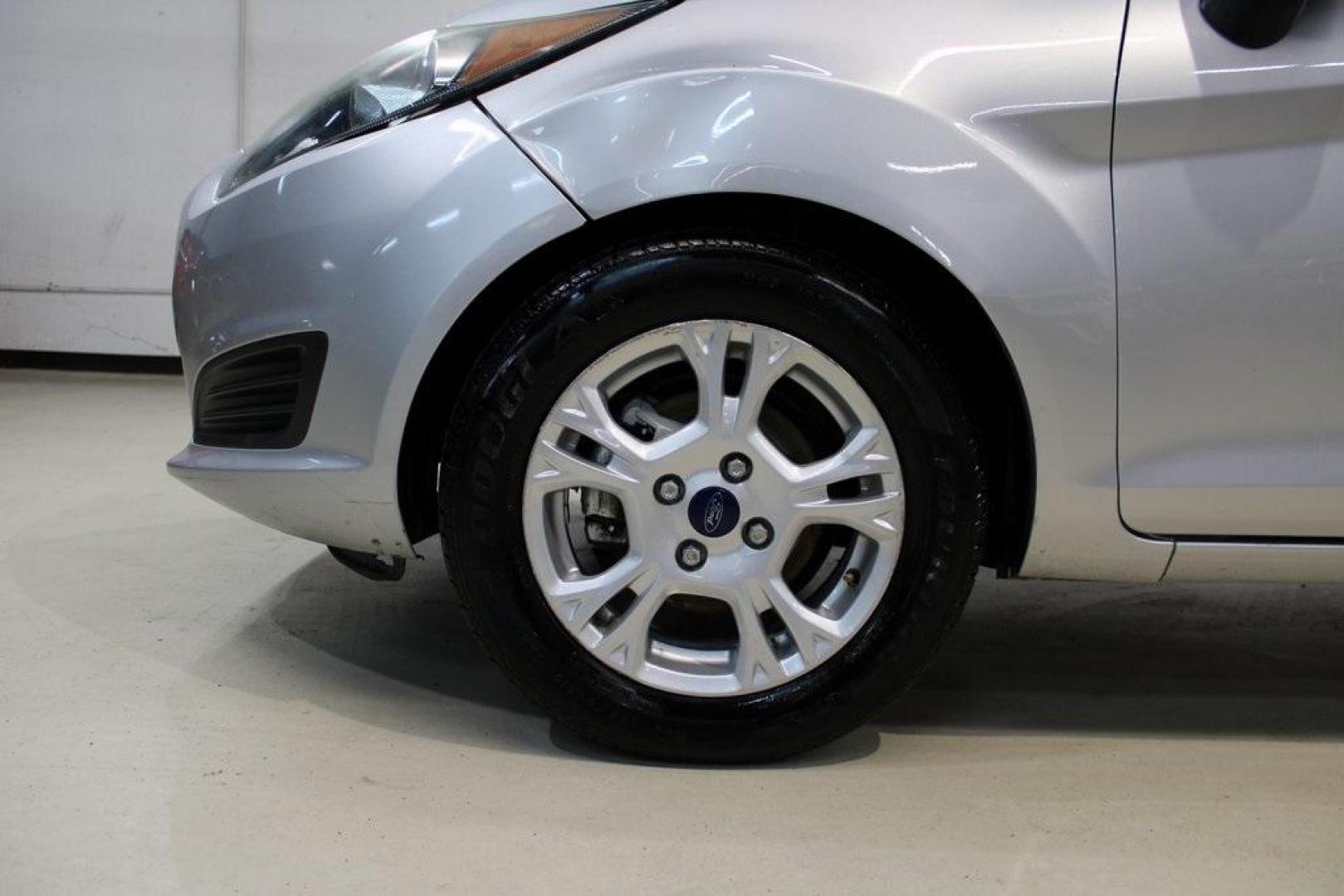 2016 Ingot Silver /Black Ford Fiesta SE (3FADP4EJ0GM) with an 1.6L I4 Ti-VCT engine, Automatic transmission, located at 15300 Midway Rd., Addison, TX, 75001, (972) 702-0011, 32.958321, -96.838074 - Introducing the 2016 Ford Fiesta SE, now available at Midway Auto Group in Addison, Texas. This compact sedan offers a perfect blend of efficiency, modern features, and spirited performance, making it an excellent choice for both city commutes and weekend adventures.<br><br>Key Features:<br><br>Engi - Photo#8
