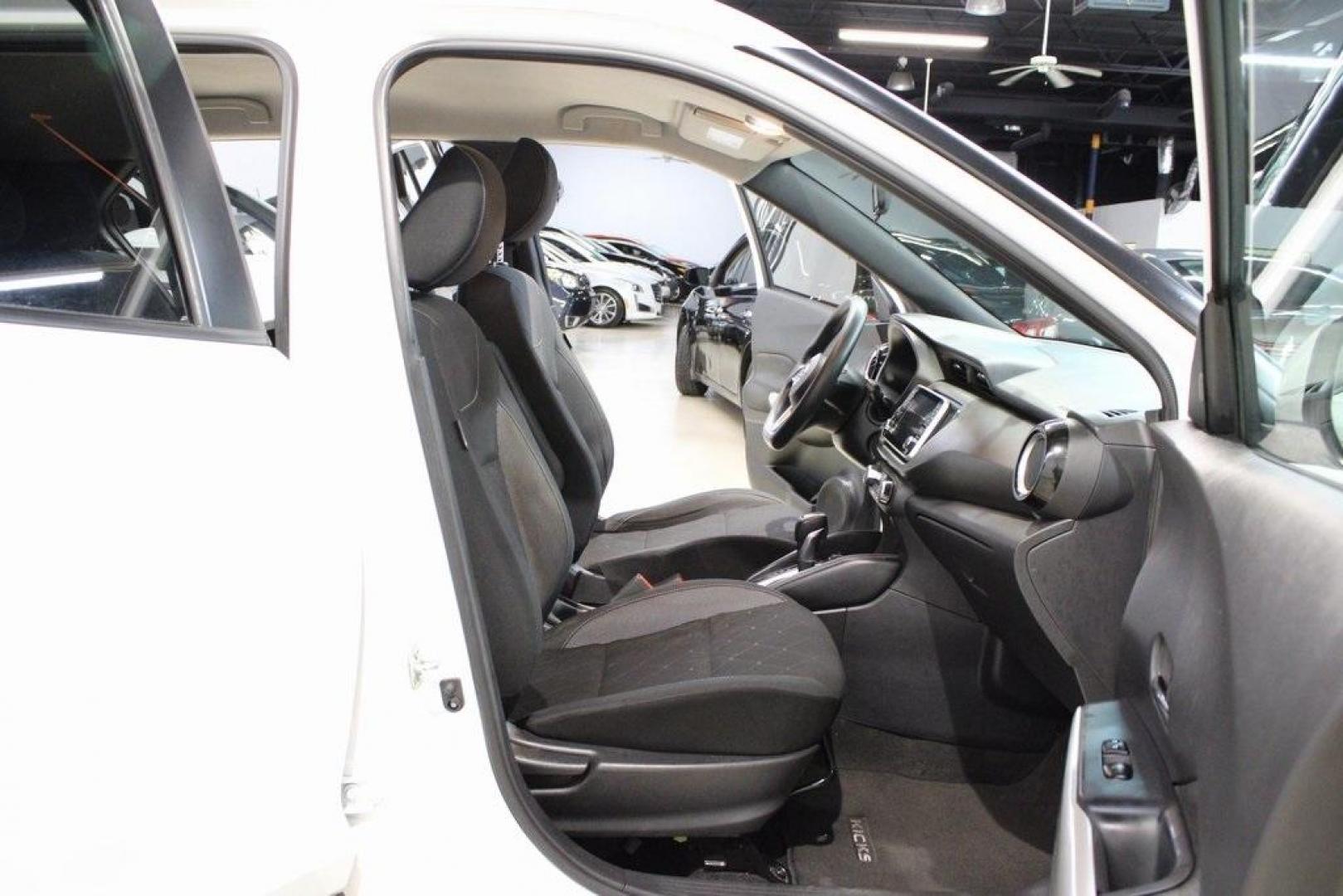 2019 Aspen White Tricoat /Charcoal Nissan Kicks SV (3N1CP5CU4KL) with an 1.6L 4-Cylinder DOHC 16V engine, CVT transmission, located at 15300 Midway Rd., Addison, TX, 75001, (972) 702-0011, 32.958321, -96.838074 - Photo#13