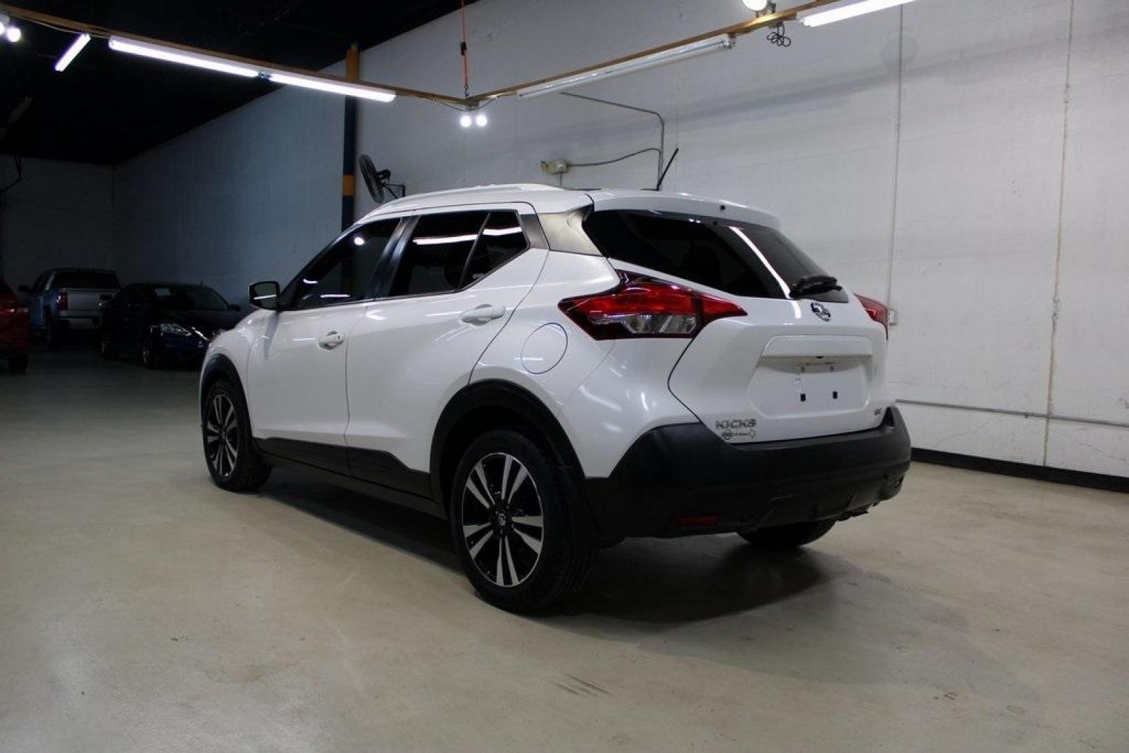 2019 Aspen White Tricoat /Charcoal Nissan Kicks SV (3N1CP5CU4KL) with an 1.6L 4-Cylinder DOHC 16V engine, CVT transmission, located at 15300 Midway Rd., Addison, TX, 75001, (972) 702-0011, 32.958321, -96.838074 - Photo#3