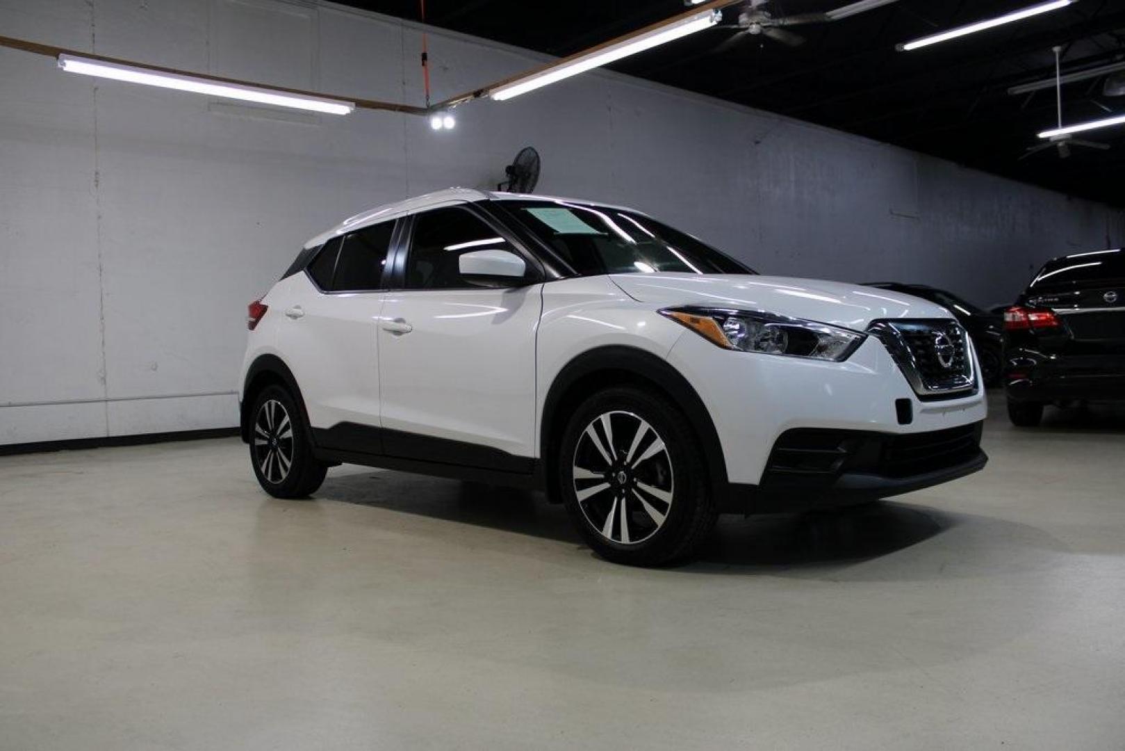 2019 Aspen White Tricoat /Charcoal Nissan Kicks SV (3N1CP5CU4KL) with an 1.6L 4-Cylinder DOHC 16V engine, CVT transmission, located at 15300 Midway Rd., Addison, TX, 75001, (972) 702-0011, 32.958321, -96.838074 - Photo#6