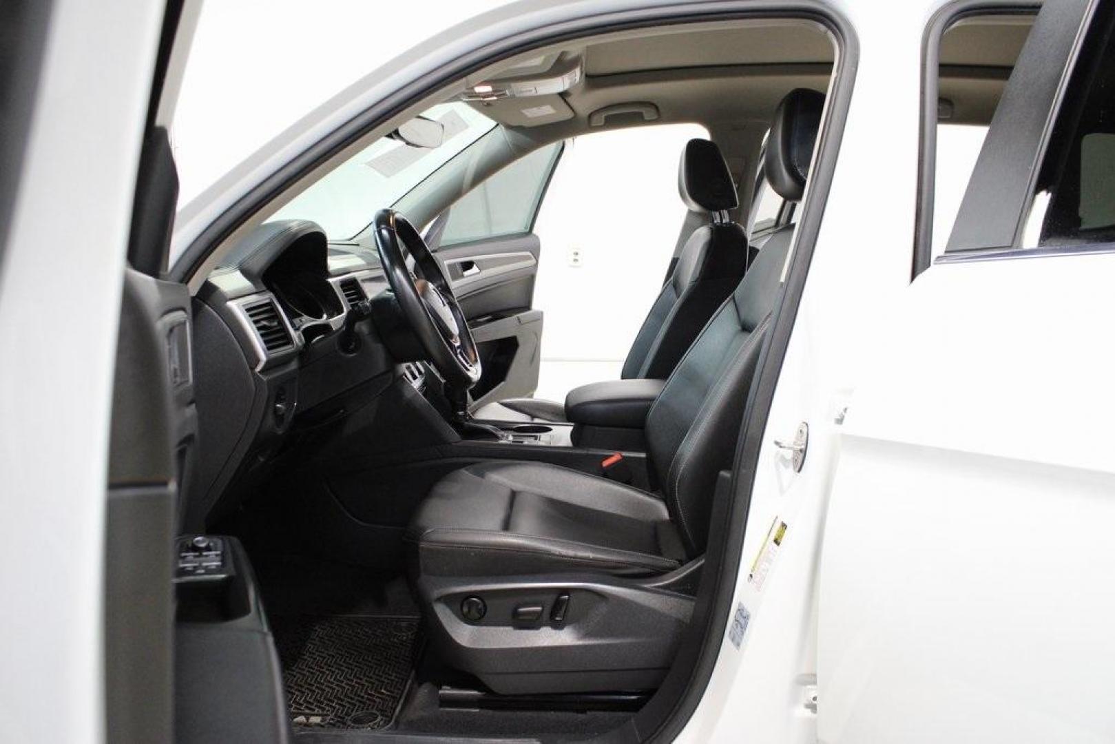 2019 Pure White /Titan Black Volkswagen Atlas 3.6L V6 SE (1V2WR2CA7KC) with an 3.6L VR6 engine, Automatic transmission, located at 15300 Midway Rd., Addison, TX, 75001, (972) 702-0011, 32.958321, -96.838074 - HOME OF THE NO HAGGLE PRICE - WHOLESALE PRICES TO THE PUBLIC!! Atlas 3.6L V6 SE w/Technology, 4D Sport Utility, 3.6L VR6, 8-Speed Automatic with Tiptronic, FWD.<br><br>Deep Black Pearl 2019 Volkswagen Atlas 3.6L V6 SE<br><br><br>Awards:<br> * 2019 KBB.com 12 Best Family Cars * 2019 KBB.com 10 Bes - Photo#14