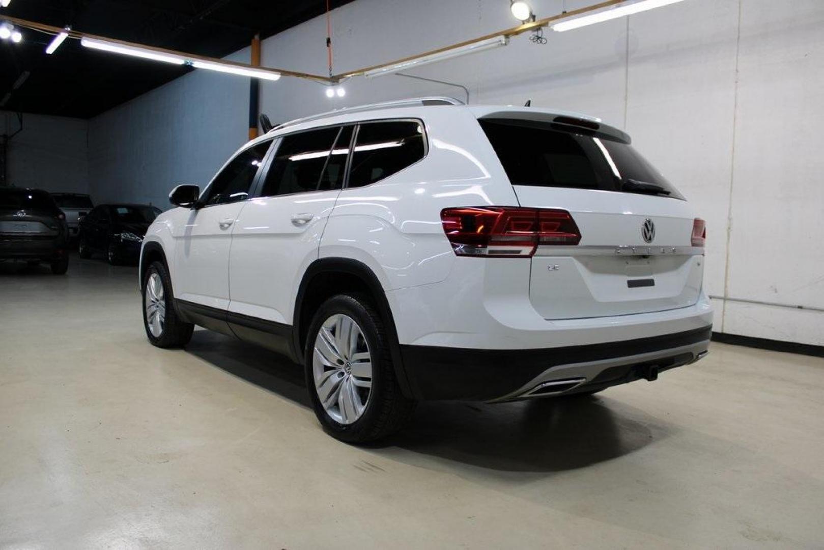 2019 Pure White /Titan Black Volkswagen Atlas 3.6L V6 SE (1V2WR2CA7KC) with an 3.6L VR6 engine, Automatic transmission, located at 15300 Midway Rd., Addison, TX, 75001, (972) 702-0011, 32.958321, -96.838074 - HOME OF THE NO HAGGLE PRICE - WHOLESALE PRICES TO THE PUBLIC!! Atlas 3.6L V6 SE w/Technology, 4D Sport Utility, 3.6L VR6, 8-Speed Automatic with Tiptronic, FWD.<br><br>Deep Black Pearl 2019 Volkswagen Atlas 3.6L V6 SE<br><br><br>Awards:<br> * 2019 KBB.com 12 Best Family Cars * 2019 KBB.com 10 Bes - Photo#3