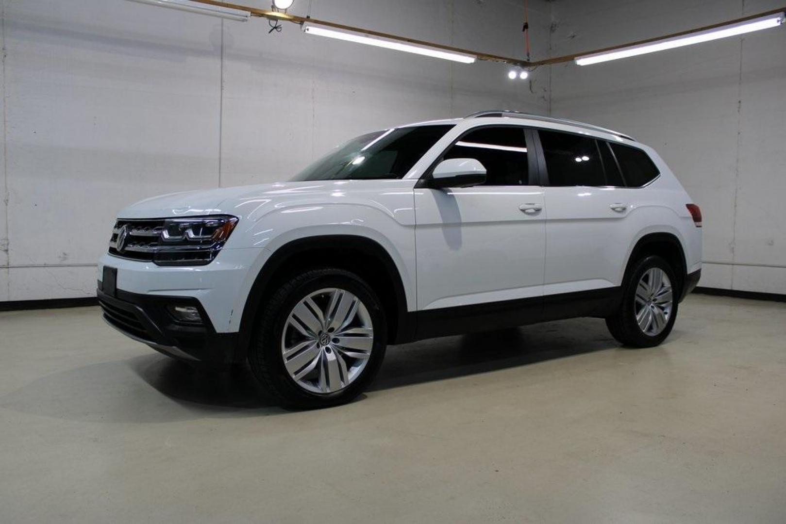 2019 Pure White /Titan Black Volkswagen Atlas 3.6L V6 SE (1V2WR2CA7KC) with an 3.6L VR6 engine, Automatic transmission, located at 15300 Midway Rd., Addison, TX, 75001, (972) 702-0011, 32.958321, -96.838074 - HOME OF THE NO HAGGLE PRICE - WHOLESALE PRICES TO THE PUBLIC!! Atlas 3.6L V6 SE w/Technology, 4D Sport Utility, 3.6L VR6, 8-Speed Automatic with Tiptronic, FWD.<br><br>Deep Black Pearl 2019 Volkswagen Atlas 3.6L V6 SE<br><br><br>Awards:<br> * 2019 KBB.com 12 Best Family Cars * 2019 KBB.com 10 Bes - Photo#4