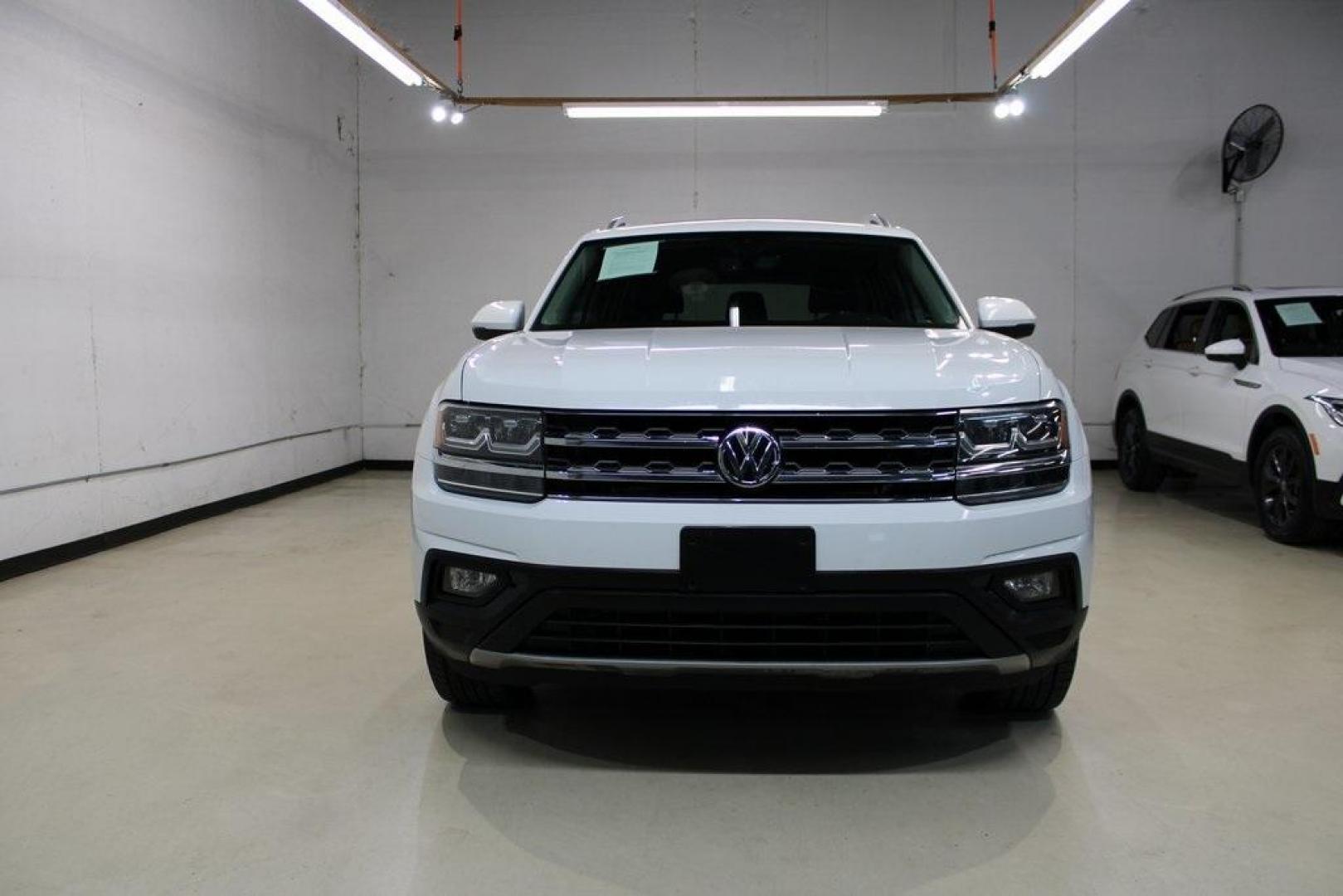 2019 Pure White /Titan Black Volkswagen Atlas 3.6L V6 SE (1V2WR2CA7KC) with an 3.6L VR6 engine, Automatic transmission, located at 15300 Midway Rd., Addison, TX, 75001, (972) 702-0011, 32.958321, -96.838074 - HOME OF THE NO HAGGLE PRICE - WHOLESALE PRICES TO THE PUBLIC!! Atlas 3.6L V6 SE w/Technology, 4D Sport Utility, 3.6L VR6, 8-Speed Automatic with Tiptronic, FWD.<br><br>Deep Black Pearl 2019 Volkswagen Atlas 3.6L V6 SE<br><br><br>Awards:<br> * 2019 KBB.com 12 Best Family Cars * 2019 KBB.com 10 Bes - Photo#5