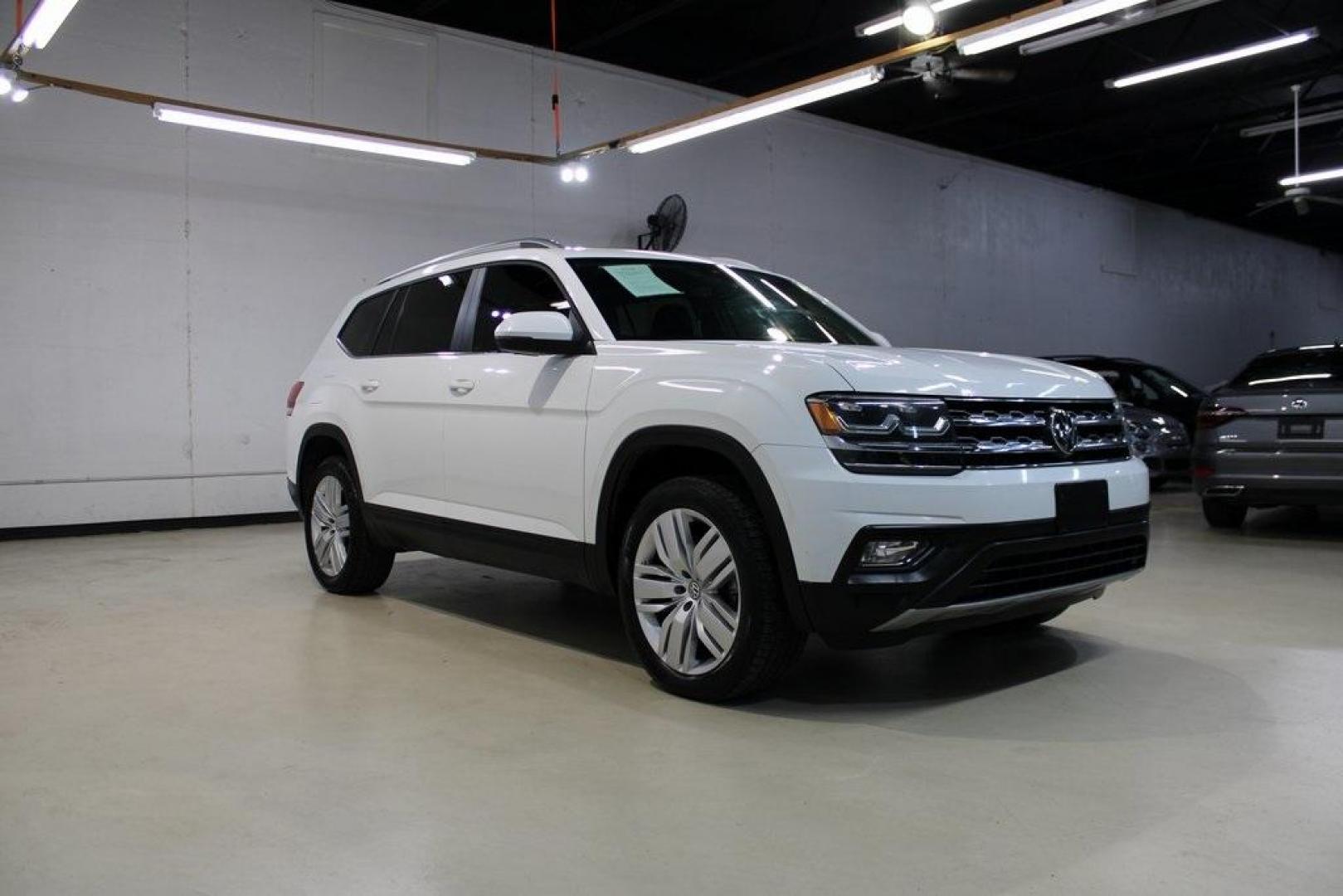 2019 Pure White /Titan Black Volkswagen Atlas 3.6L V6 SE (1V2WR2CA7KC) with an 3.6L VR6 engine, Automatic transmission, located at 15300 Midway Rd., Addison, TX, 75001, (972) 702-0011, 32.958321, -96.838074 - HOME OF THE NO HAGGLE PRICE - WHOLESALE PRICES TO THE PUBLIC!! Atlas 3.6L V6 SE w/Technology, 4D Sport Utility, 3.6L VR6, 8-Speed Automatic with Tiptronic, FWD.<br><br>Deep Black Pearl 2019 Volkswagen Atlas 3.6L V6 SE<br><br><br>Awards:<br> * 2019 KBB.com 12 Best Family Cars * 2019 KBB.com 10 Bes - Photo#6