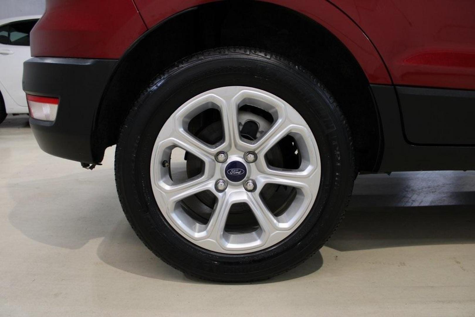 2021 Ruby Red /Ebony Black Ford EcoSport SE (MAJ3S2GE7MC) with an EcoBoost 1.0L I3 GTDi DOHC Turbocharged VCT engine, Automatic transmission, located at 15300 Midway Rd., Addison, TX, 75001, (972) 702-0011, 32.958321, -96.838074 - Introducing the 2021 Ford EcoSport SE, now available at Midway Auto Group in Addison, Texas. This compact SUV offers a perfect blend of efficiency, versatility, and modern features, making it an ideal choice for both city commutes and weekend adventures.<br><br>Key Features:<br><br>Engine: 1.0L EcoB - Photo#10
