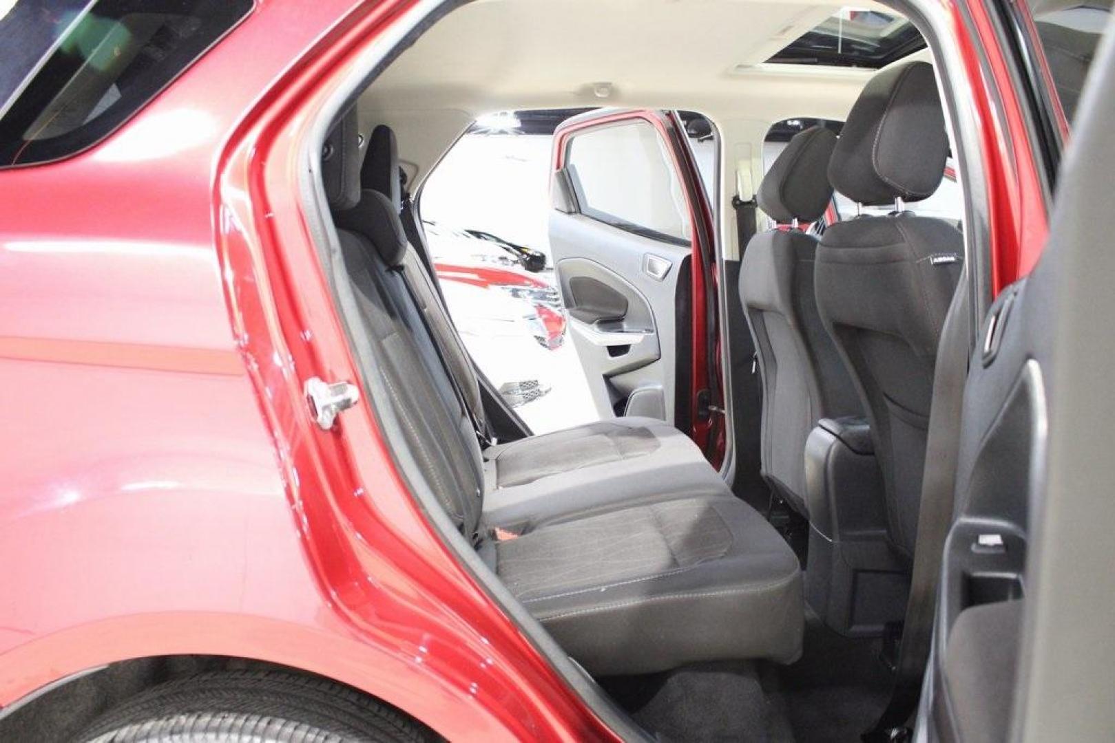 2021 Ruby Red /Ebony Black Ford EcoSport SE (MAJ3S2GE7MC) with an EcoBoost 1.0L I3 GTDi DOHC Turbocharged VCT engine, Automatic transmission, located at 15300 Midway Rd., Addison, TX, 75001, (972) 702-0011, 32.958321, -96.838074 - Introducing the 2021 Ford EcoSport SE, now available at Midway Auto Group in Addison, Texas. This compact SUV offers a perfect blend of efficiency, versatility, and modern features, making it an ideal choice for both city commutes and weekend adventures.<br><br>Key Features:<br><br>Engine: 1.0L EcoB - Photo#15