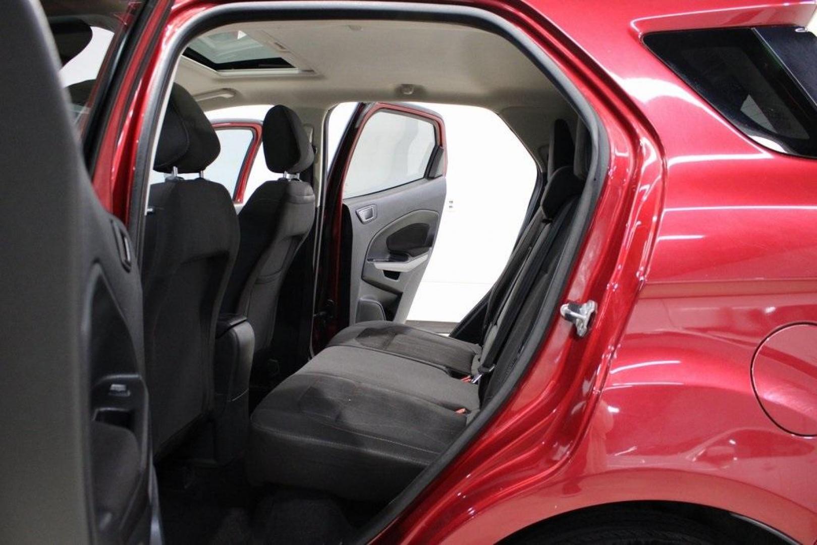 2021 Ruby Red /Ebony Black Ford EcoSport SE (MAJ3S2GE7MC) with an EcoBoost 1.0L I3 GTDi DOHC Turbocharged VCT engine, Automatic transmission, located at 15300 Midway Rd., Addison, TX, 75001, (972) 702-0011, 32.958321, -96.838074 - Introducing the 2021 Ford EcoSport SE, now available at Midway Auto Group in Addison, Texas. This compact SUV offers a perfect blend of efficiency, versatility, and modern features, making it an ideal choice for both city commutes and weekend adventures.<br><br>Key Features:<br><br>Engine: 1.0L EcoB - Photo#16