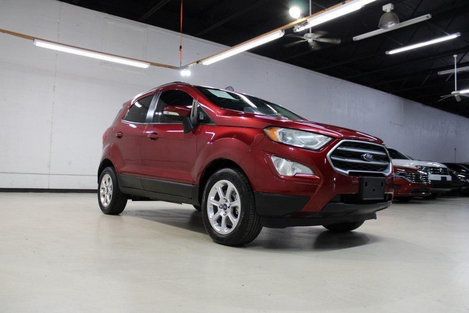 2021 Ruby Red /Ebony Black Ford EcoSport SE (MAJ3S2GE7MC) with an EcoBoost 1.0L I3 GTDi DOHC Turbocharged VCT engine, Automatic transmission, located at 15300 Midway Rd., Addison, TX, 75001, (972) 702-0011, 32.958321, -96.838074 - Introducing the 2021 Ford EcoSport SE, now available at Midway Auto Group in Addison, Texas. This compact SUV offers a perfect blend of efficiency, versatility, and modern features, making it an ideal choice for both city commutes and weekend adventures.<br><br>Key Features:<br><br>Engine: 1.0L EcoB - Photo#1