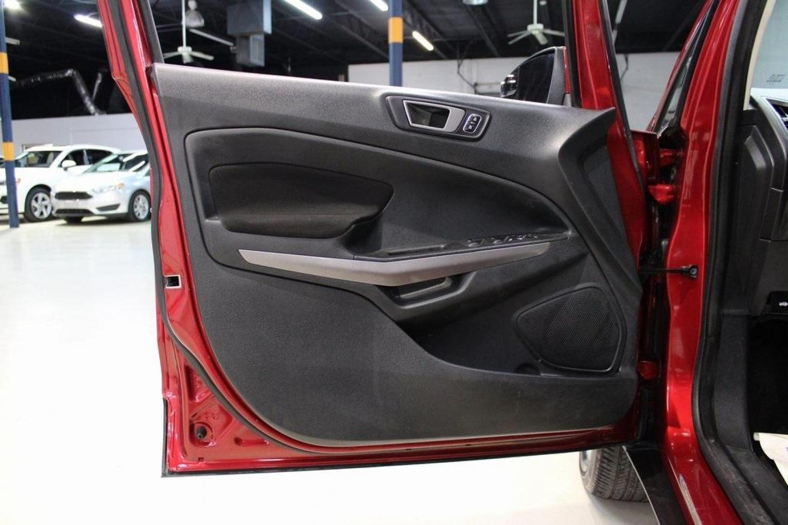 2021 Ruby Red /Ebony Black Ford EcoSport SE (MAJ3S2GE7MC) with an EcoBoost 1.0L I3 GTDi DOHC Turbocharged VCT engine, Automatic transmission, located at 15300 Midway Rd., Addison, TX, 75001, (972) 702-0011, 32.958321, -96.838074 - Introducing the 2021 Ford EcoSport SE, now available at Midway Auto Group in Addison, Texas. This compact SUV offers a perfect blend of efficiency, versatility, and modern features, making it an ideal choice for both city commutes and weekend adventures.<br><br>Key Features:<br><br>Engine: 1.0L EcoB - Photo#26