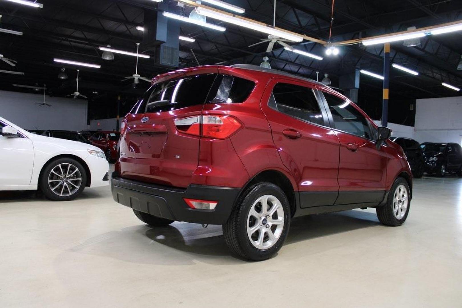 2021 Ruby Red /Ebony Black Ford EcoSport SE (MAJ3S2GE7MC) with an EcoBoost 1.0L I3 GTDi DOHC Turbocharged VCT engine, Automatic transmission, located at 15300 Midway Rd., Addison, TX, 75001, (972) 702-0011, 32.958321, -96.838074 - Introducing the 2021 Ford EcoSport SE, now available at Midway Auto Group in Addison, Texas. This compact SUV offers a perfect blend of efficiency, versatility, and modern features, making it an ideal choice for both city commutes and weekend adventures.<br><br>Key Features:<br><br>Engine: 1.0L EcoB - Photo#2