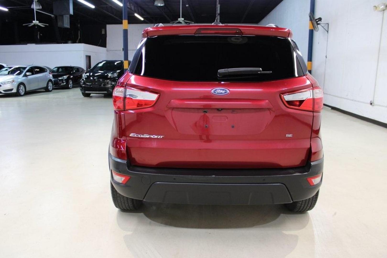 2021 Ruby Red /Ebony Black Ford EcoSport SE (MAJ3S2GE7MC) with an EcoBoost 1.0L I3 GTDi DOHC Turbocharged VCT engine, Automatic transmission, located at 15300 Midway Rd., Addison, TX, 75001, (972) 702-0011, 32.958321, -96.838074 - Introducing the 2021 Ford EcoSport SE, now available at Midway Auto Group in Addison, Texas. This compact SUV offers a perfect blend of efficiency, versatility, and modern features, making it an ideal choice for both city commutes and weekend adventures.<br><br>Key Features:<br><br>Engine: 1.0L EcoB - Photo#7