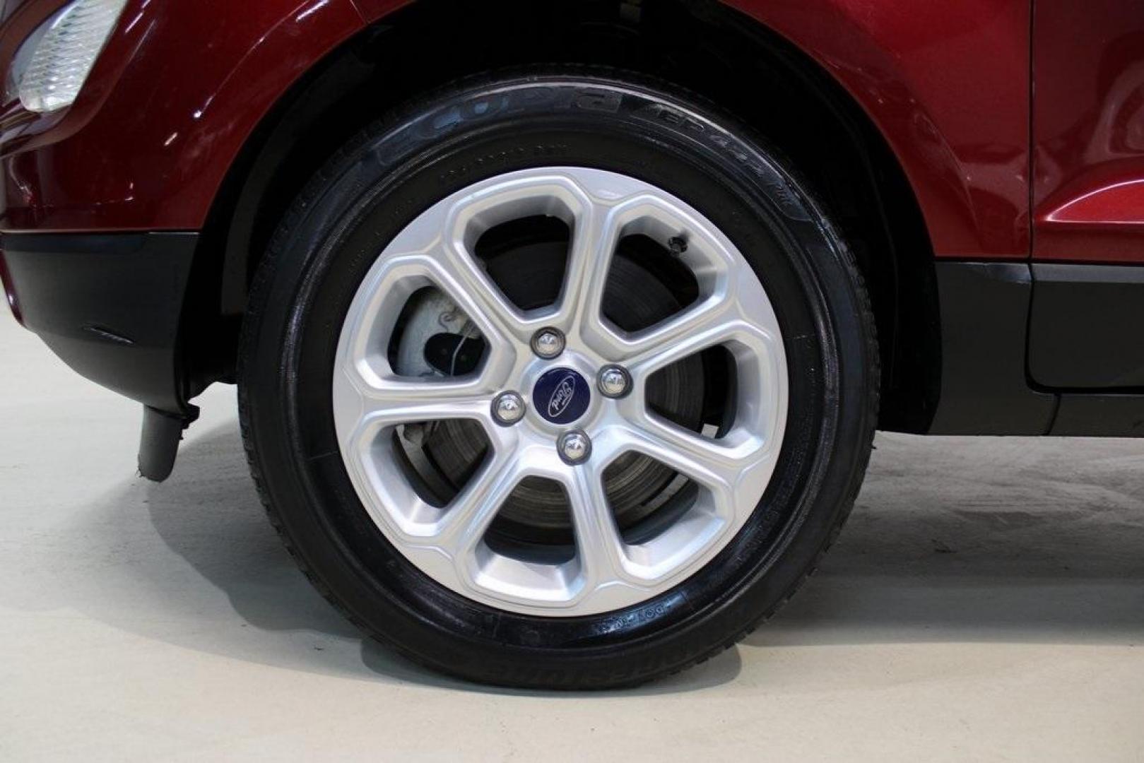 2021 Ruby Red /Ebony Black Ford EcoSport SE (MAJ3S2GE7MC) with an EcoBoost 1.0L I3 GTDi DOHC Turbocharged VCT engine, Automatic transmission, located at 15300 Midway Rd., Addison, TX, 75001, (972) 702-0011, 32.958321, -96.838074 - Introducing the 2021 Ford EcoSport SE, now available at Midway Auto Group in Addison, Texas. This compact SUV offers a perfect blend of efficiency, versatility, and modern features, making it an ideal choice for both city commutes and weekend adventures.<br><br>Key Features:<br><br>Engine: 1.0L EcoB - Photo#8