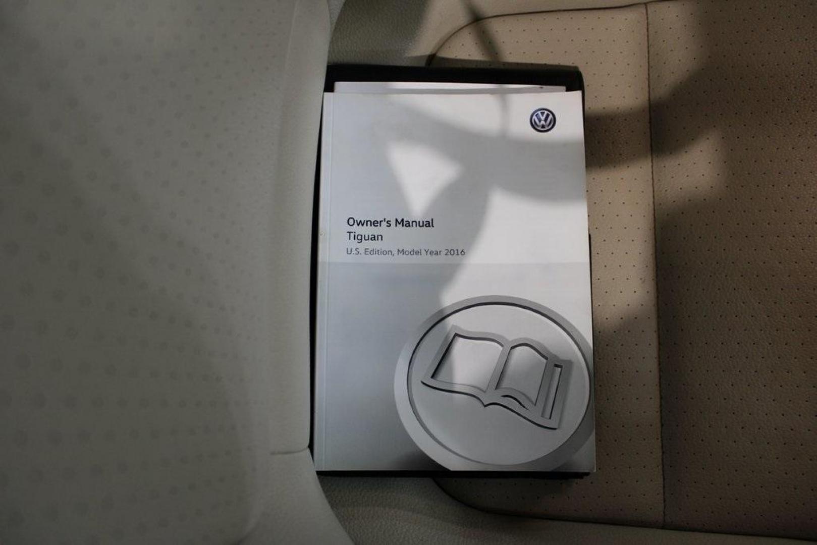 2016 Pure White Volkswagen Tiguan S (WVGAV7AX2GW) with an 2.0L 4-Cylinder Turbocharged engine, Automatic transmission, located at 15300 Midway Rd., Addison, TX, 75001, (972) 702-0011, 32.958321, -96.838074 - Photo#12