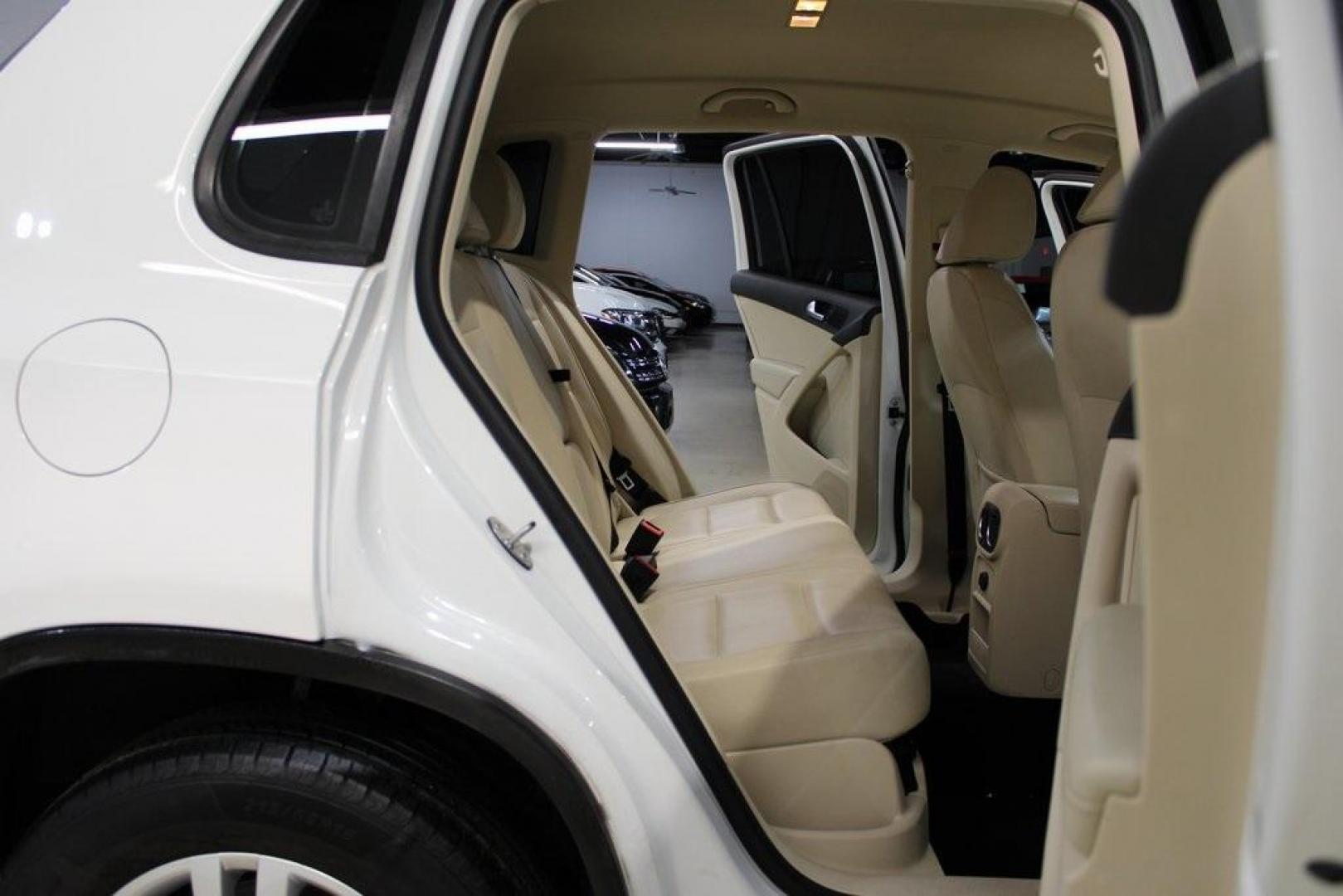 2016 Pure White Volkswagen Tiguan S (WVGAV7AX2GW) with an 2.0L 4-Cylinder Turbocharged engine, Automatic transmission, located at 15300 Midway Rd., Addison, TX, 75001, (972) 702-0011, 32.958321, -96.838074 - Photo#15
