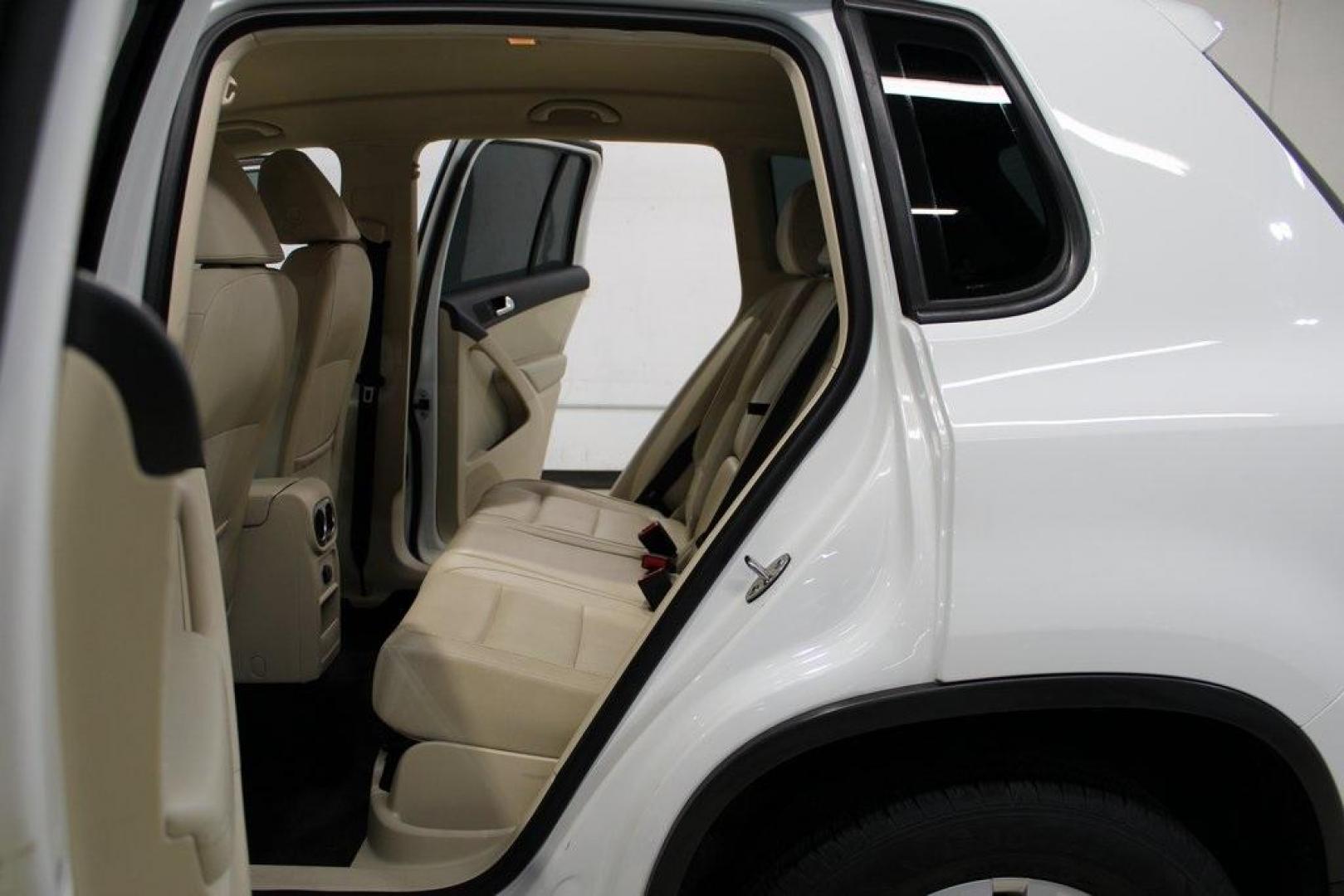 2016 Pure White Volkswagen Tiguan S (WVGAV7AX2GW) with an 2.0L 4-Cylinder Turbocharged engine, Automatic transmission, located at 15300 Midway Rd., Addison, TX, 75001, (972) 702-0011, 32.958321, -96.838074 - Photo#16