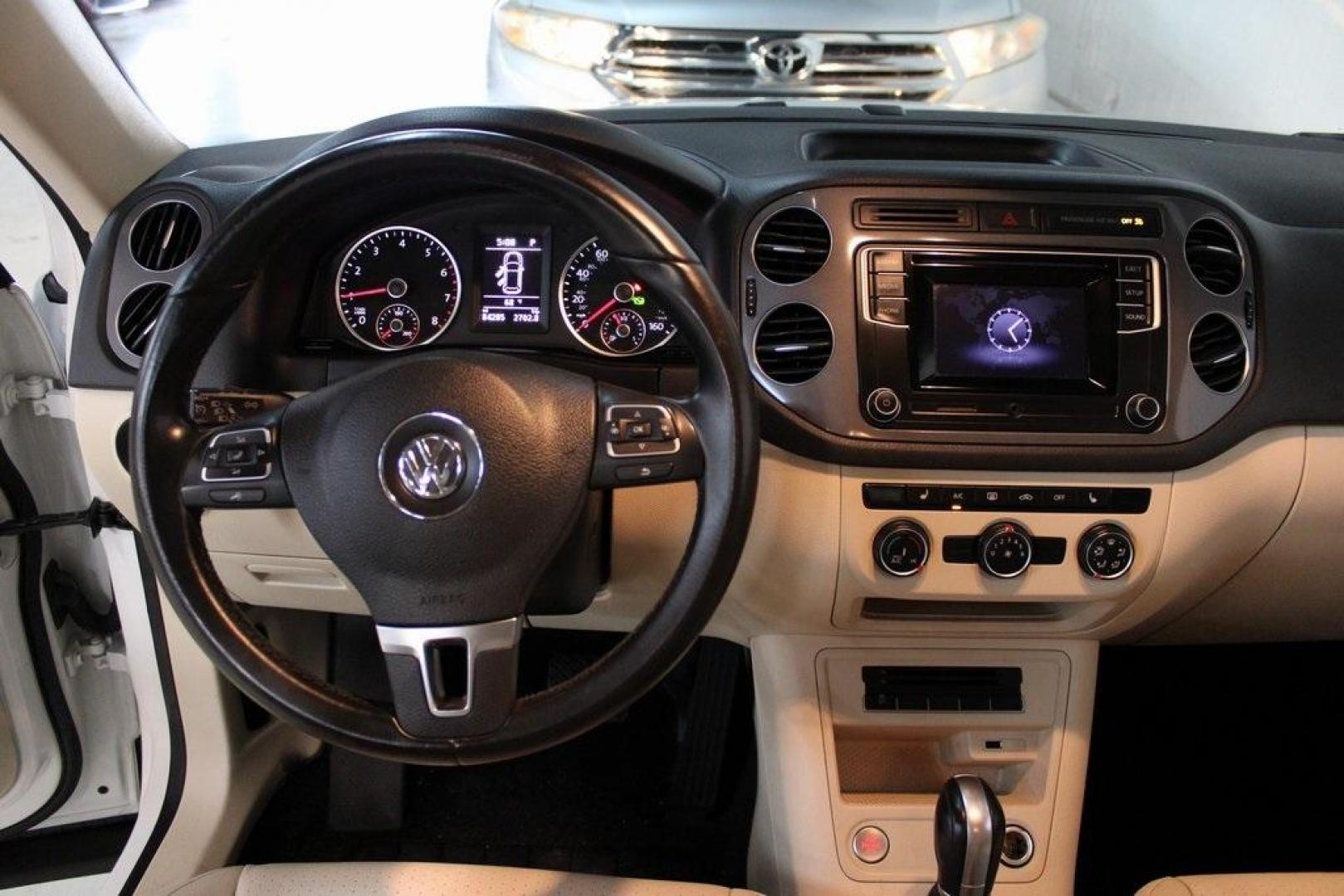 2016 Pure White Volkswagen Tiguan S (WVGAV7AX2GW) with an 2.0L 4-Cylinder Turbocharged engine, Automatic transmission, located at 15300 Midway Rd., Addison, TX, 75001, (972) 702-0011, 32.958321, -96.838074 - Photo#17