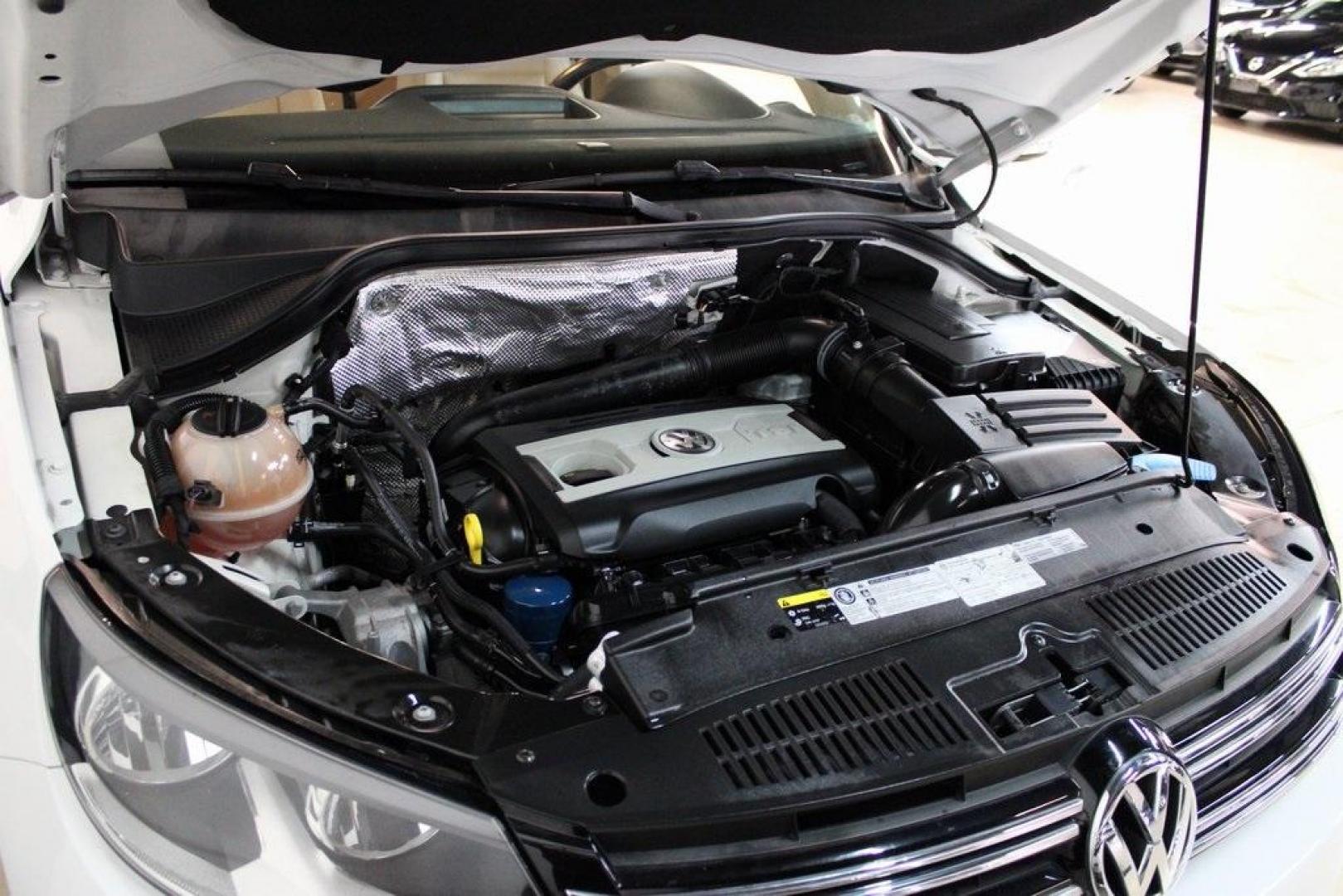 2016 Pure White Volkswagen Tiguan S (WVGAV7AX2GW) with an 2.0L 4-Cylinder Turbocharged engine, Automatic transmission, located at 15300 Midway Rd., Addison, TX, 75001, (972) 702-0011, 32.958321, -96.838074 - Photo#27