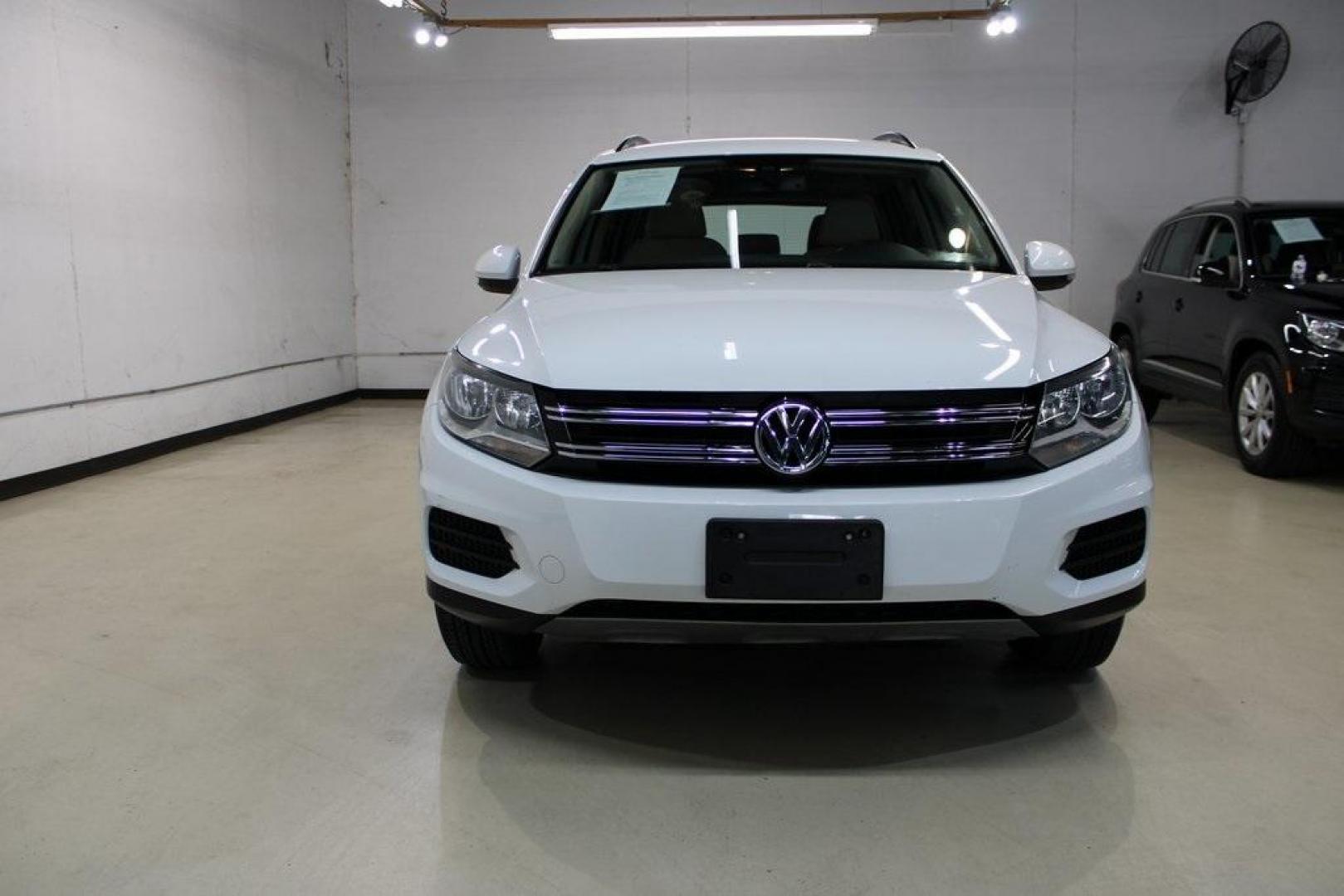 2016 Pure White Volkswagen Tiguan S (WVGAV7AX2GW) with an 2.0L 4-Cylinder Turbocharged engine, Automatic transmission, located at 15300 Midway Rd., Addison, TX, 75001, (972) 702-0011, 32.958321, -96.838074 - Photo#5