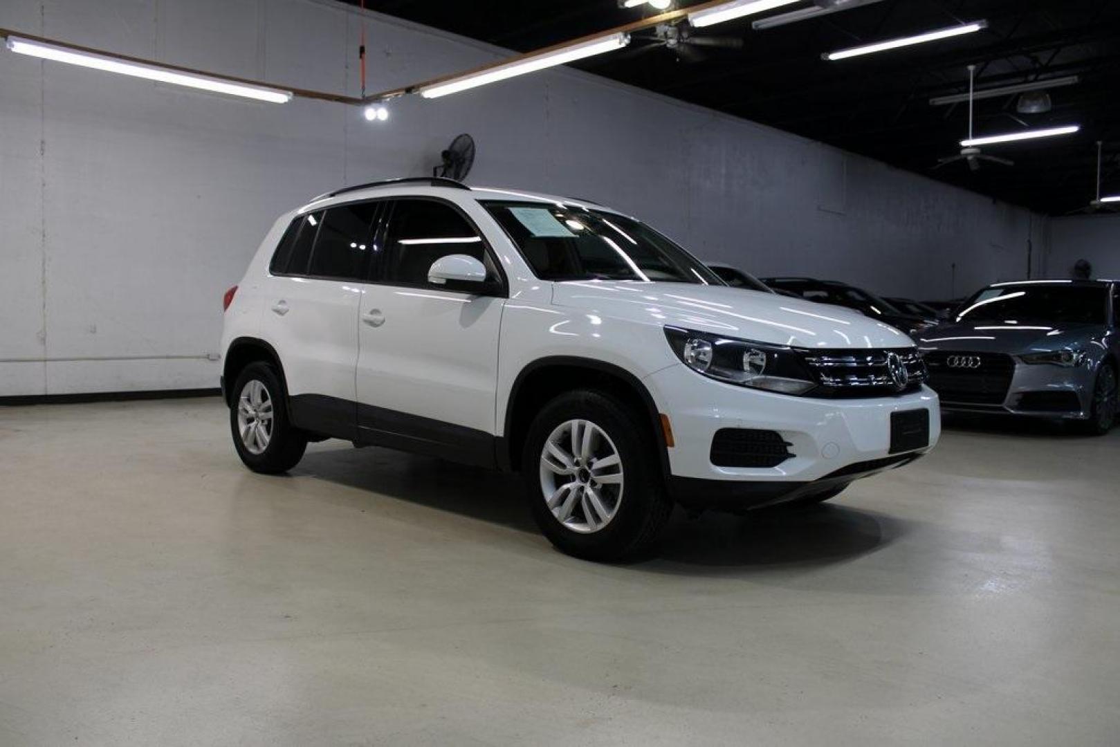 2016 Pure White Volkswagen Tiguan S (WVGAV7AX2GW) with an 2.0L 4-Cylinder Turbocharged engine, Automatic transmission, located at 15300 Midway Rd., Addison, TX, 75001, (972) 702-0011, 32.958321, -96.838074 - Photo#6
