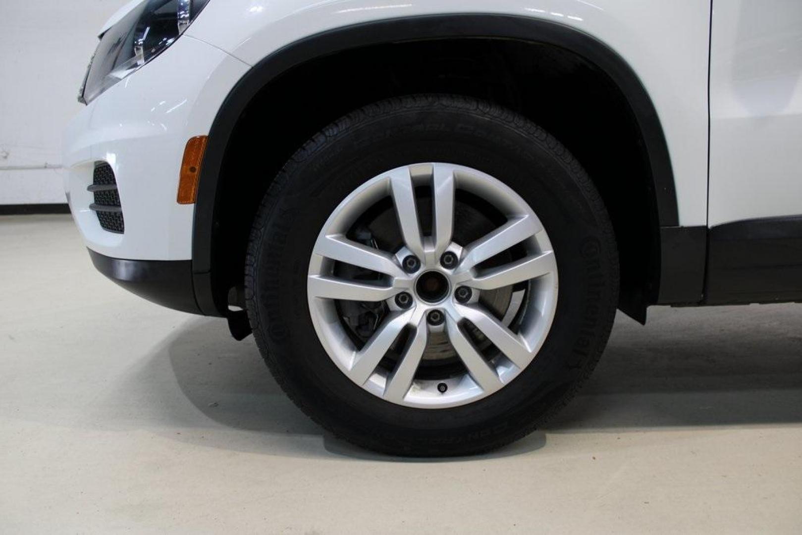 2016 Pure White Volkswagen Tiguan S (WVGAV7AX2GW) with an 2.0L 4-Cylinder Turbocharged engine, Automatic transmission, located at 15300 Midway Rd., Addison, TX, 75001, (972) 702-0011, 32.958321, -96.838074 - Photo#8