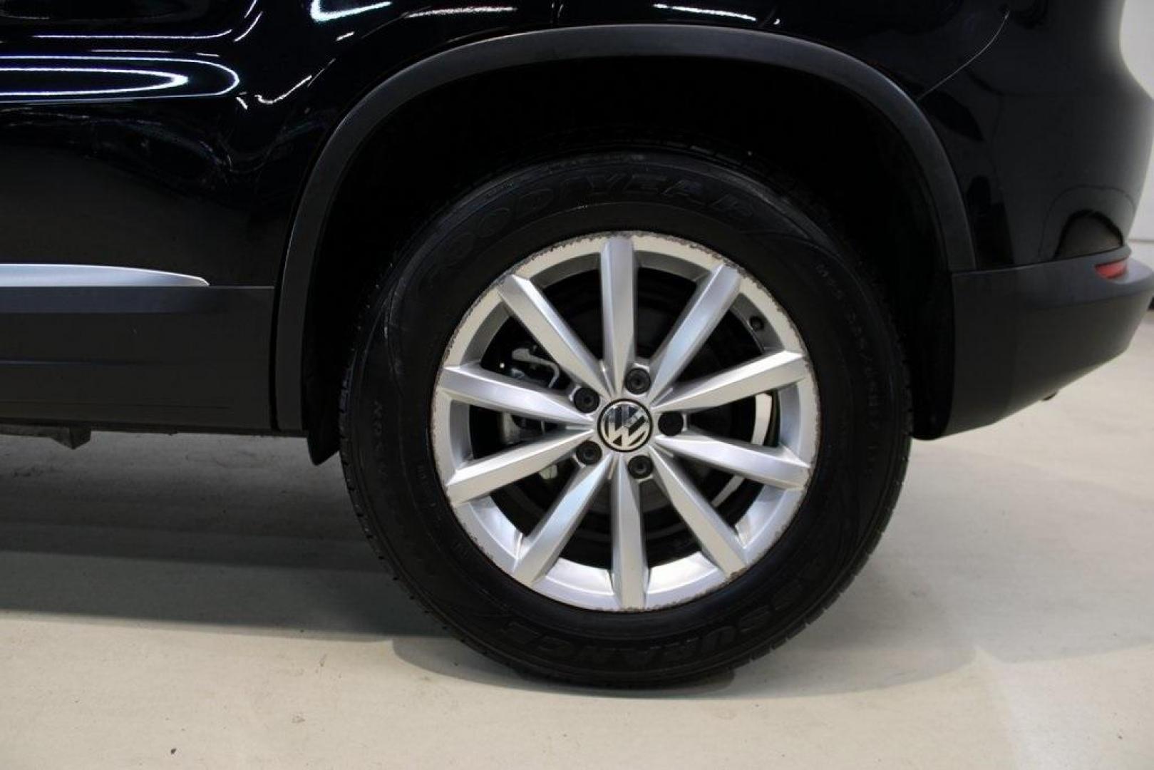 2017 Deep Black /Beige/Black Volkswagen Tiguan 2.0T Wolfsburg Edition (WVGRV7AX9HW) with an 2.0L TSI DOHC engine, Automatic transmission, located at 15300 Midway Rd., Addison, TX, 75001, (972) 702-0011, 32.958321, -96.838074 - Photo#9