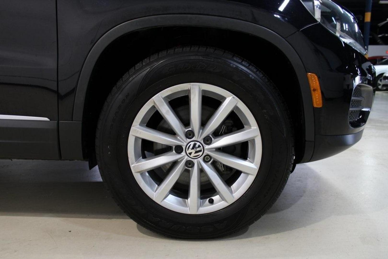 2017 Deep Black /Beige/Black Volkswagen Tiguan 2.0T Wolfsburg Edition (WVGRV7AX9HW) with an 2.0L TSI DOHC engine, Automatic transmission, located at 15300 Midway Rd., Addison, TX, 75001, (972) 702-0011, 32.958321, -96.838074 - Photo#11